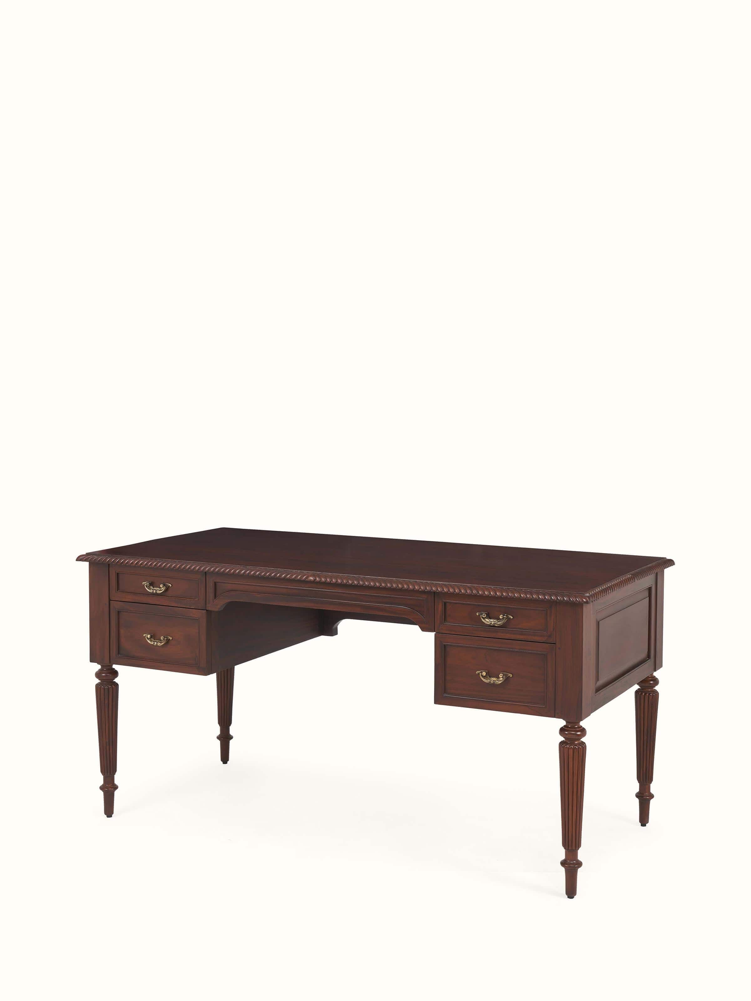 Angle view of Mahogany wood study table emphasizing drawer depth and classic carved legs