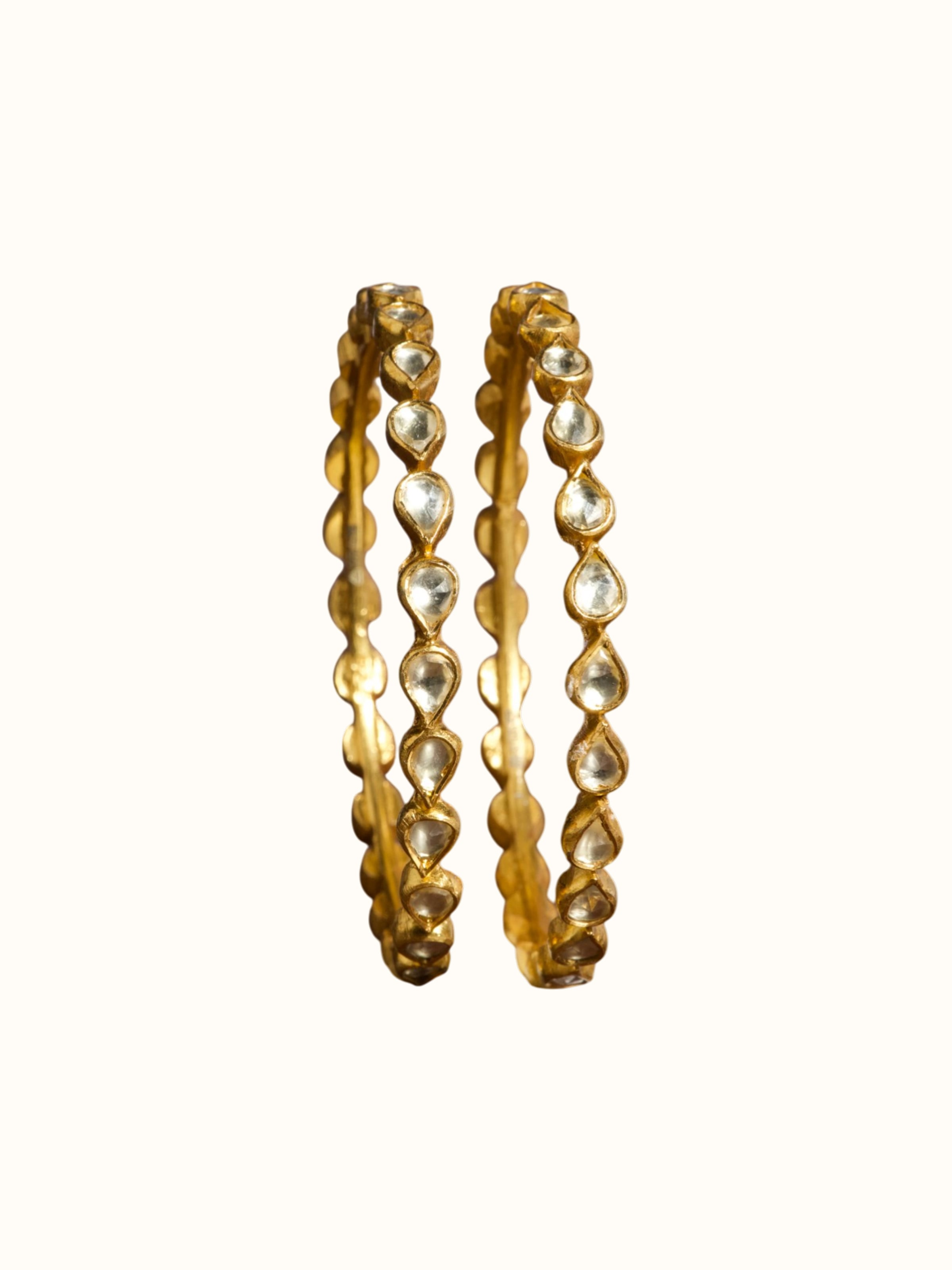 front view of silver smithing gold plated bangle with polished finish