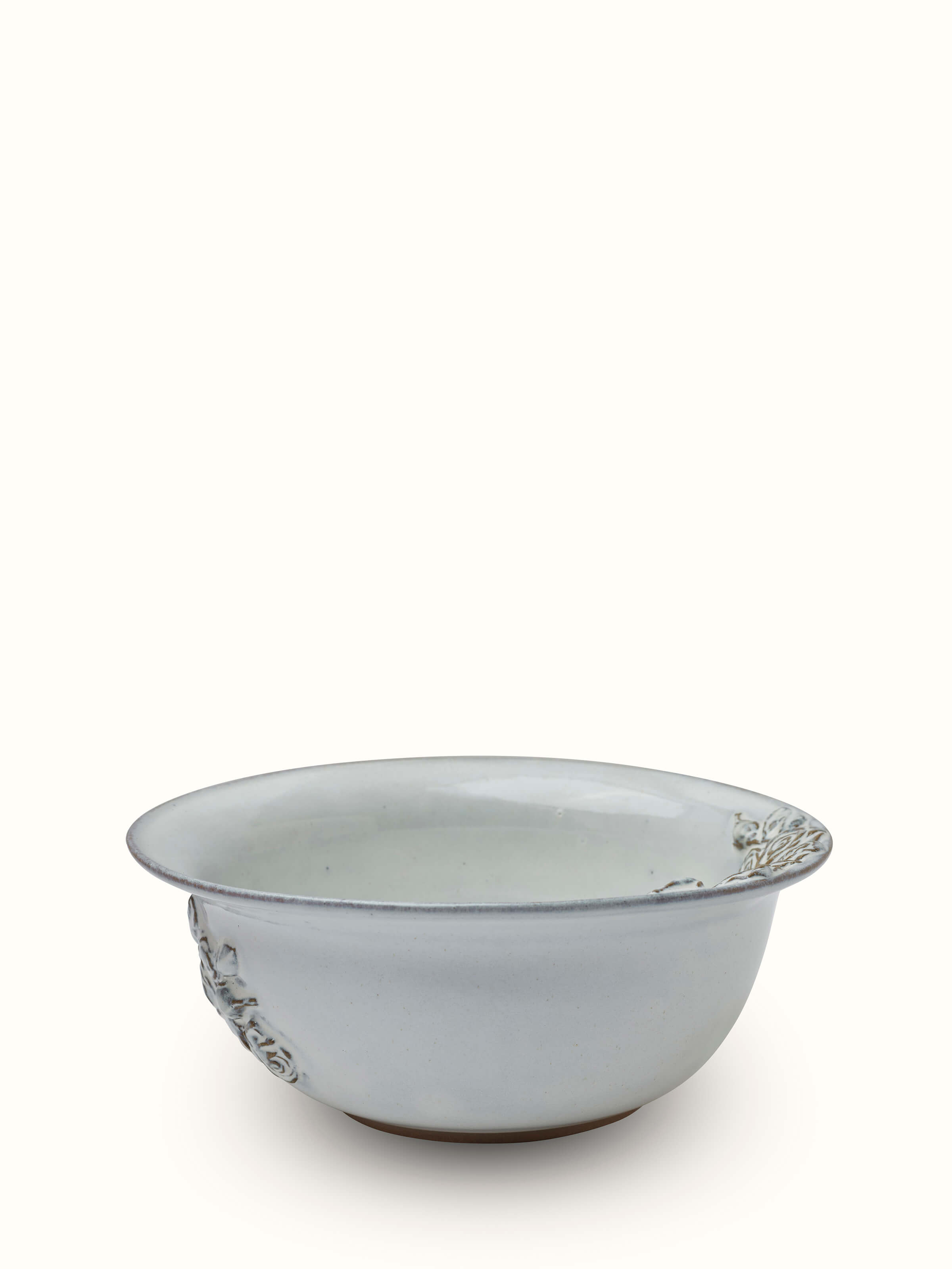 Angled view of Studio Pottery Ceramic Serving Bowl in white, emphasizing its elegant design and craftsmanship