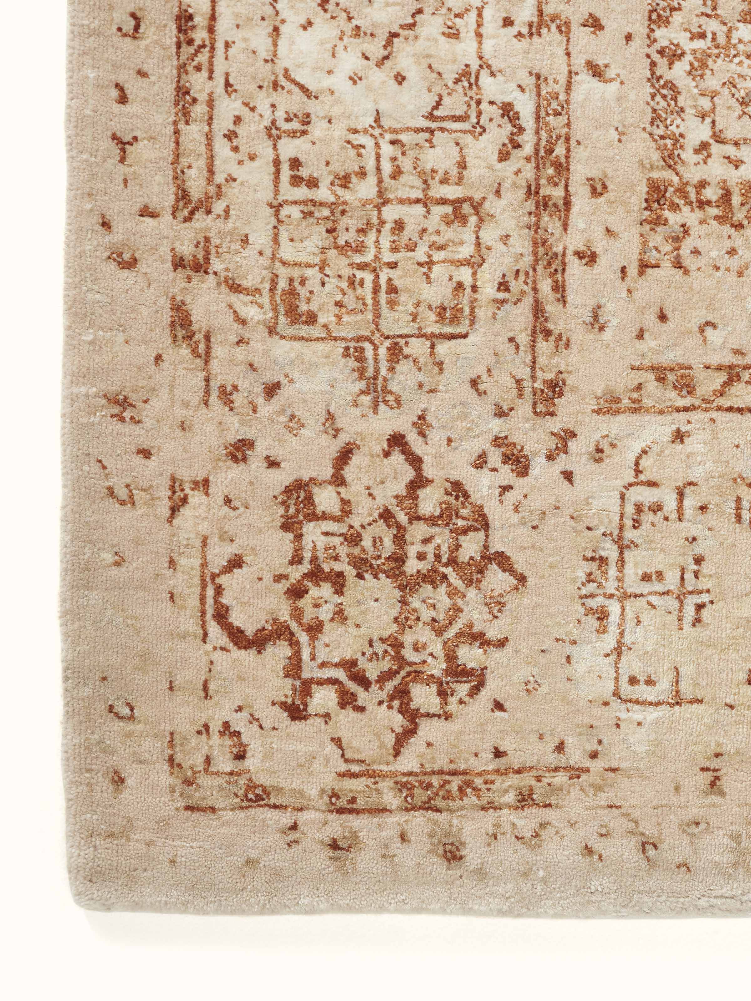 Detailed view of Distressed Mamluk Beige Rust Bhadohi Wool & Viscose Hand-Knotted Rug focusing on the weave and distressing