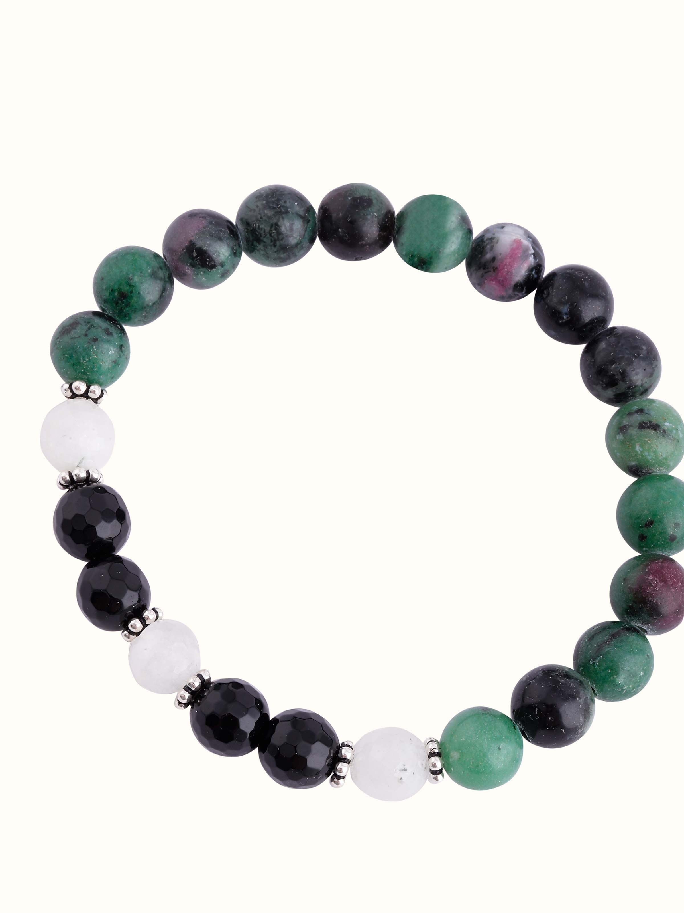 Overhead view of Malachite, Onyx & Moonstone Bracelet, displaying its geometric pattern and refined elegance