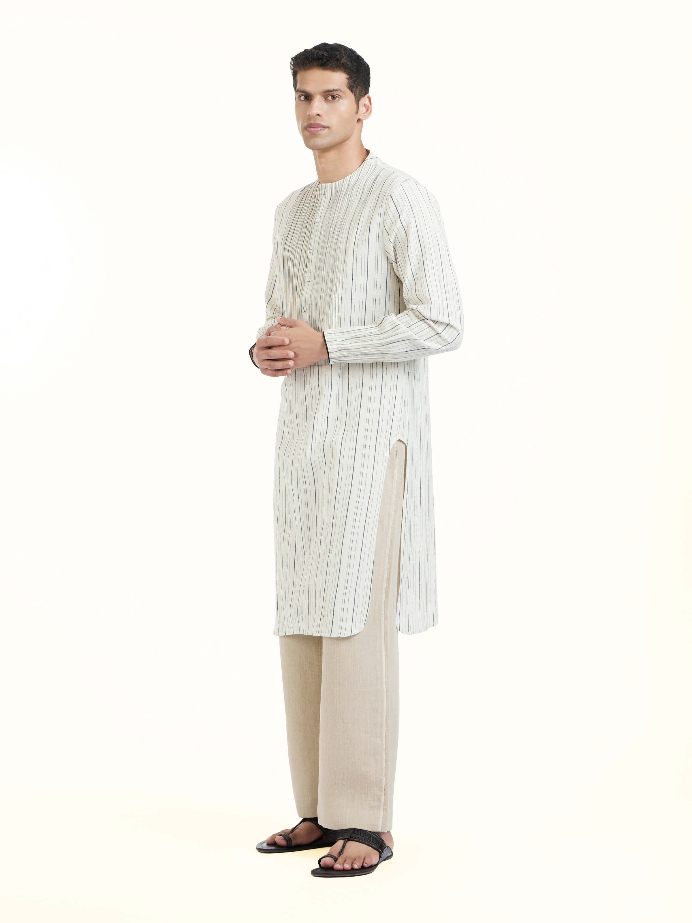 Side view of ivory silk handloom kurta with straight classic fit