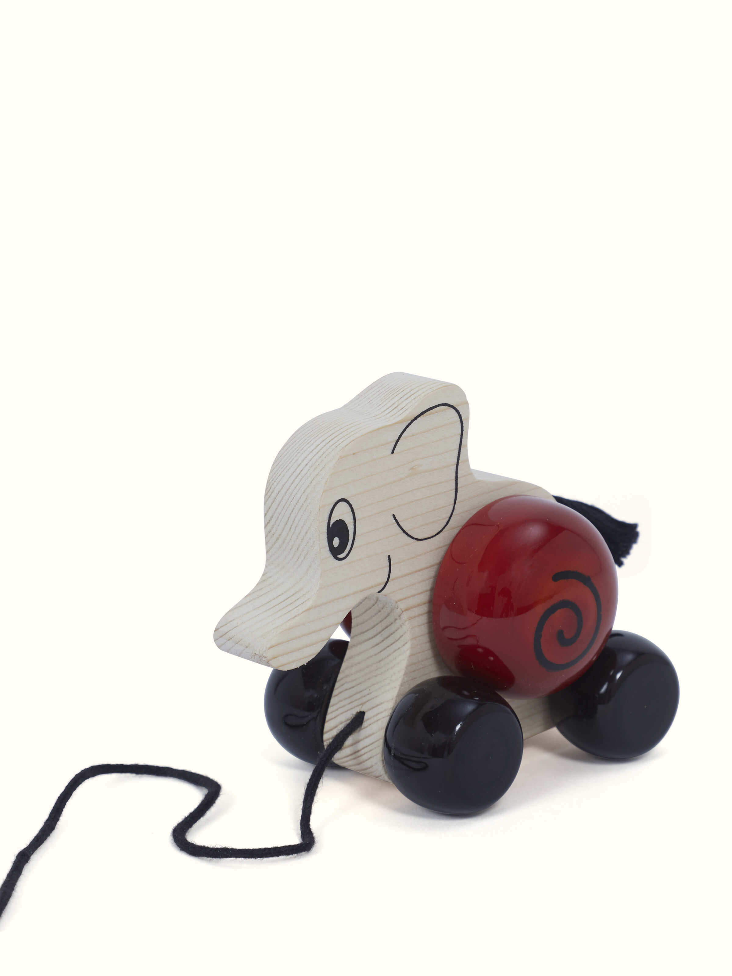 Side view of Channapatna Wooden Elifa Toy highlighting its detailed craftsmanship and wooden finish.