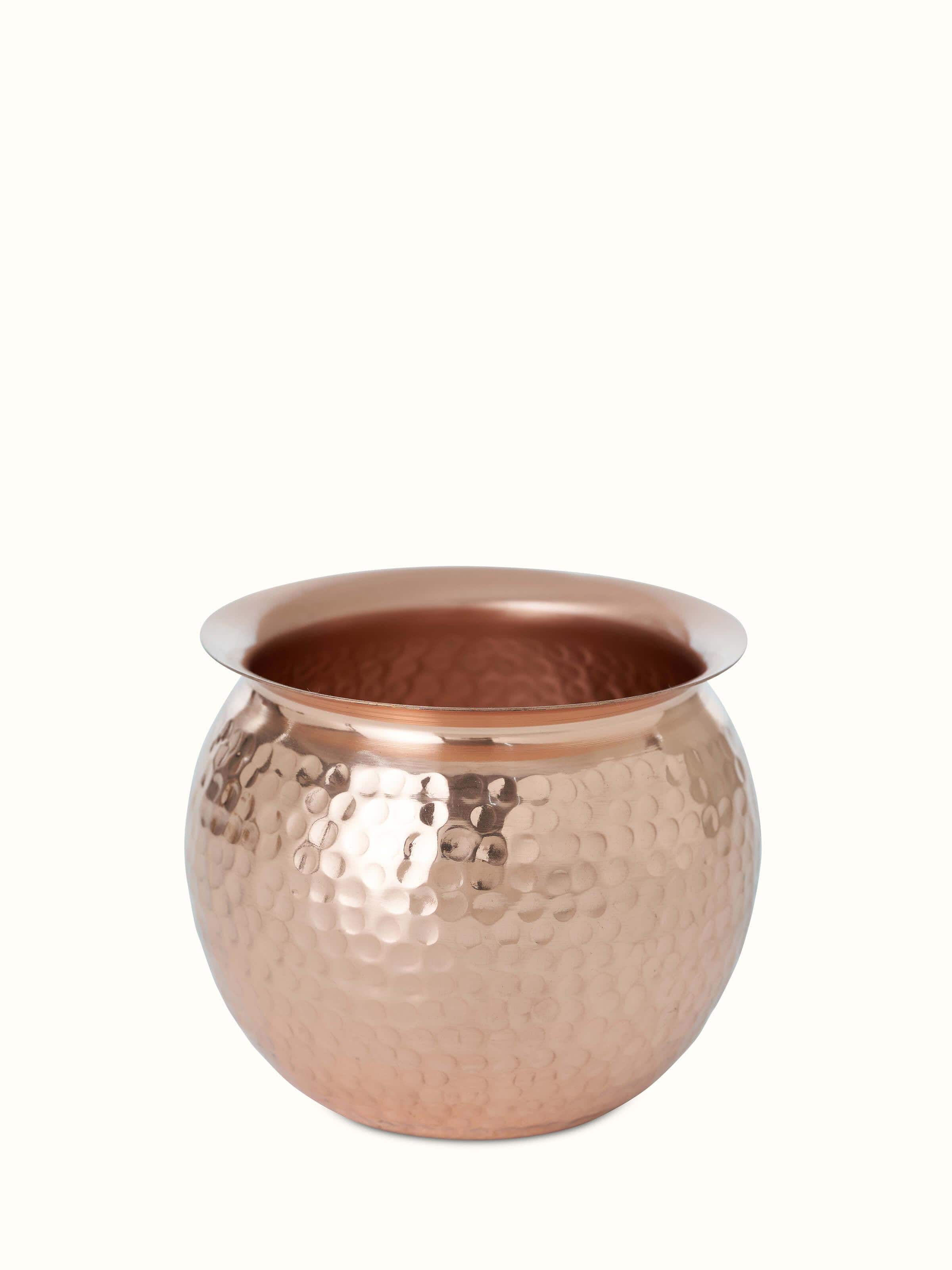 Front view of Polished copperware kalash