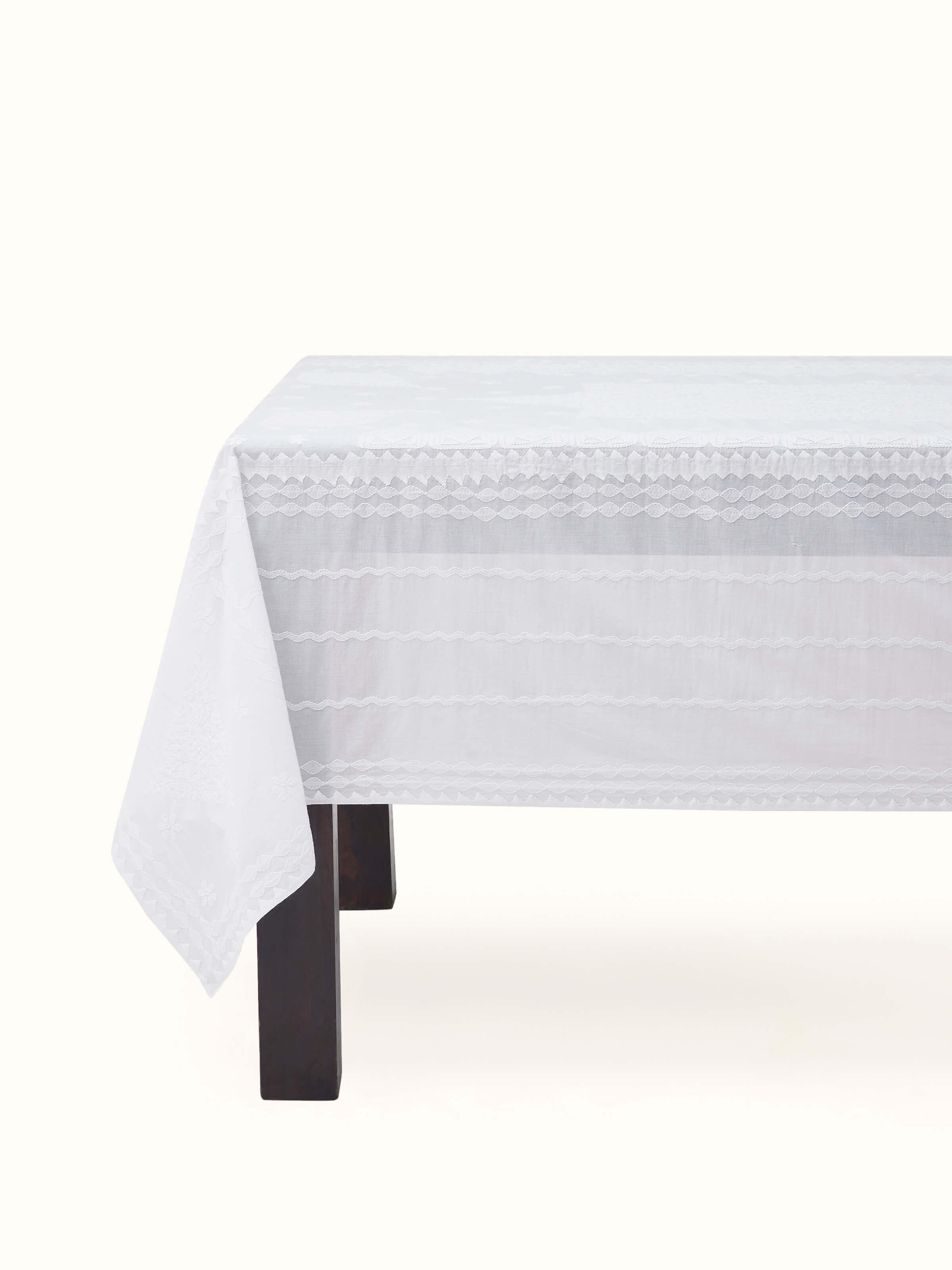 Front view showcasing the elegant white medallion design with delicate Chikankari hand embroidery on cotton fabric, sized for 4 seater tables