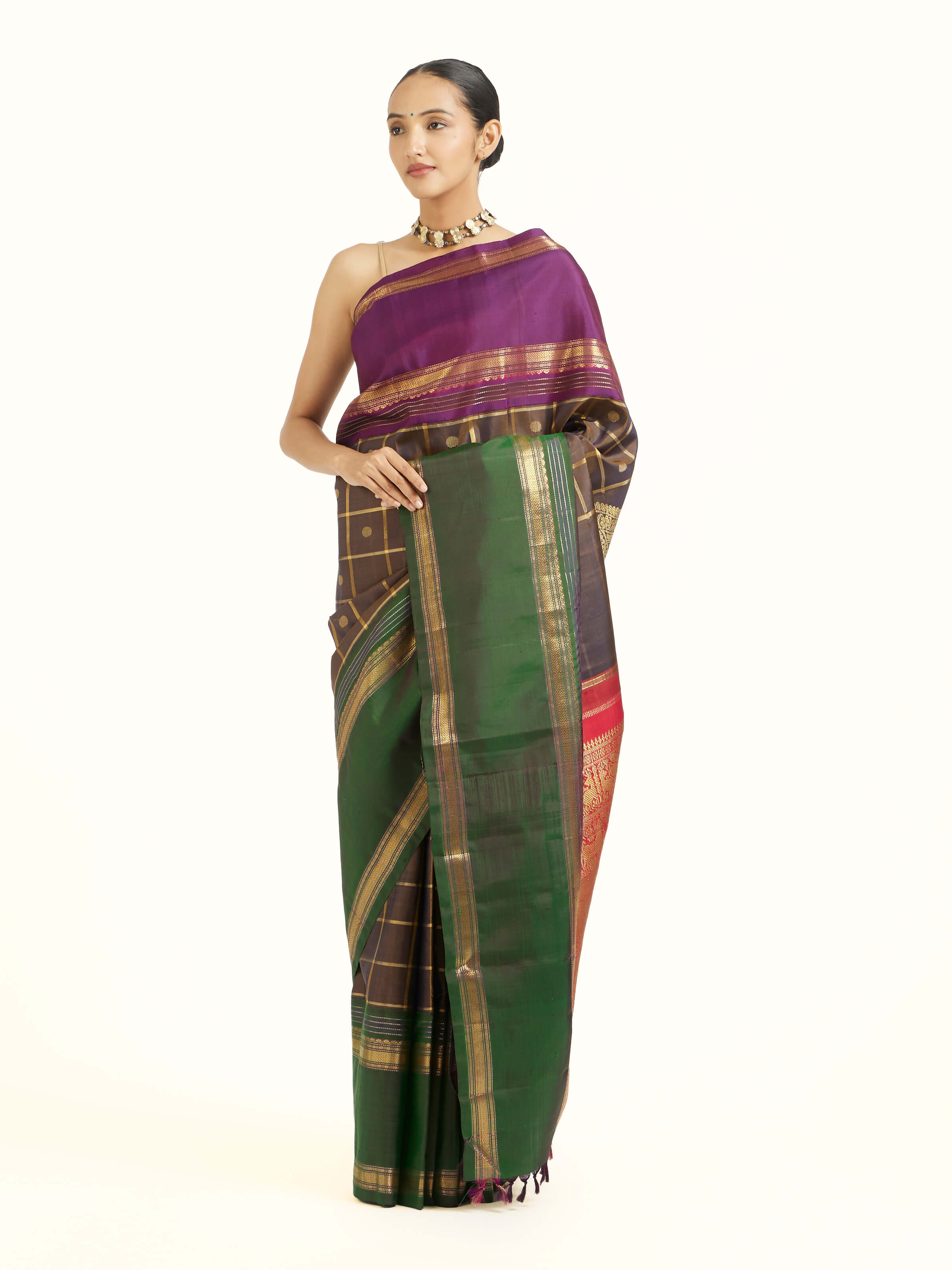 Side view of black silk Kancheepuram saree with elegant drape and contrast border