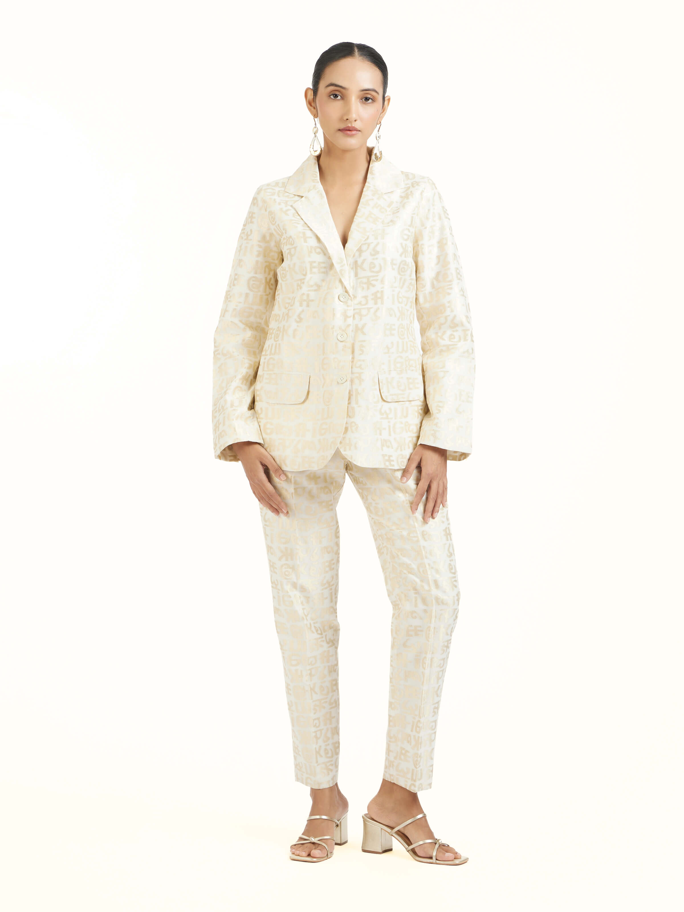 Front view of ivory handloom cut work calligraphy co-ord set showcasing delicate embroidery and lightweight fabric