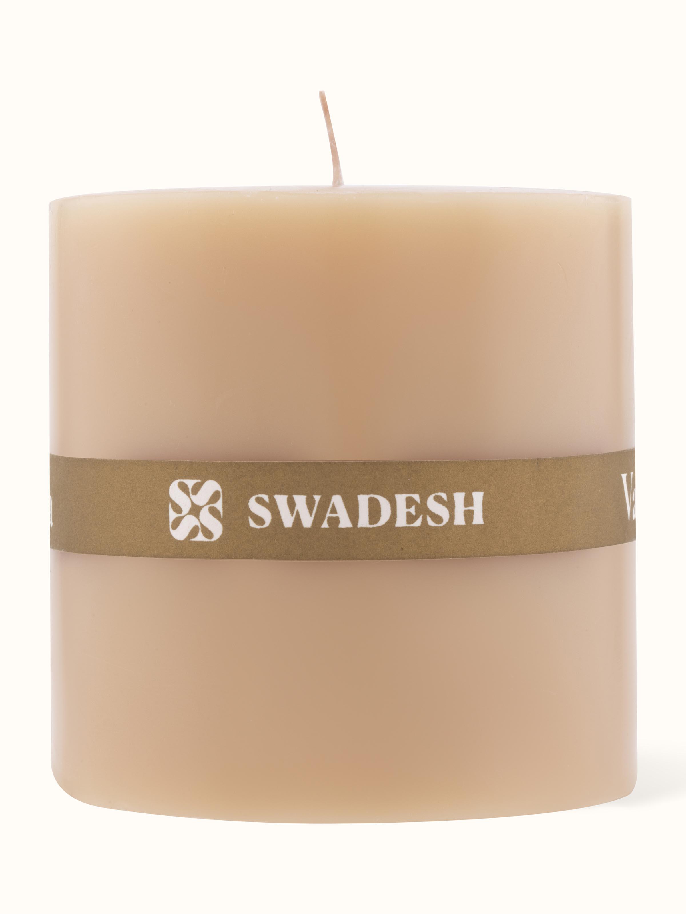 Vanilla pillar candle (3 inches) with a close-up view highlighting its texture and color.