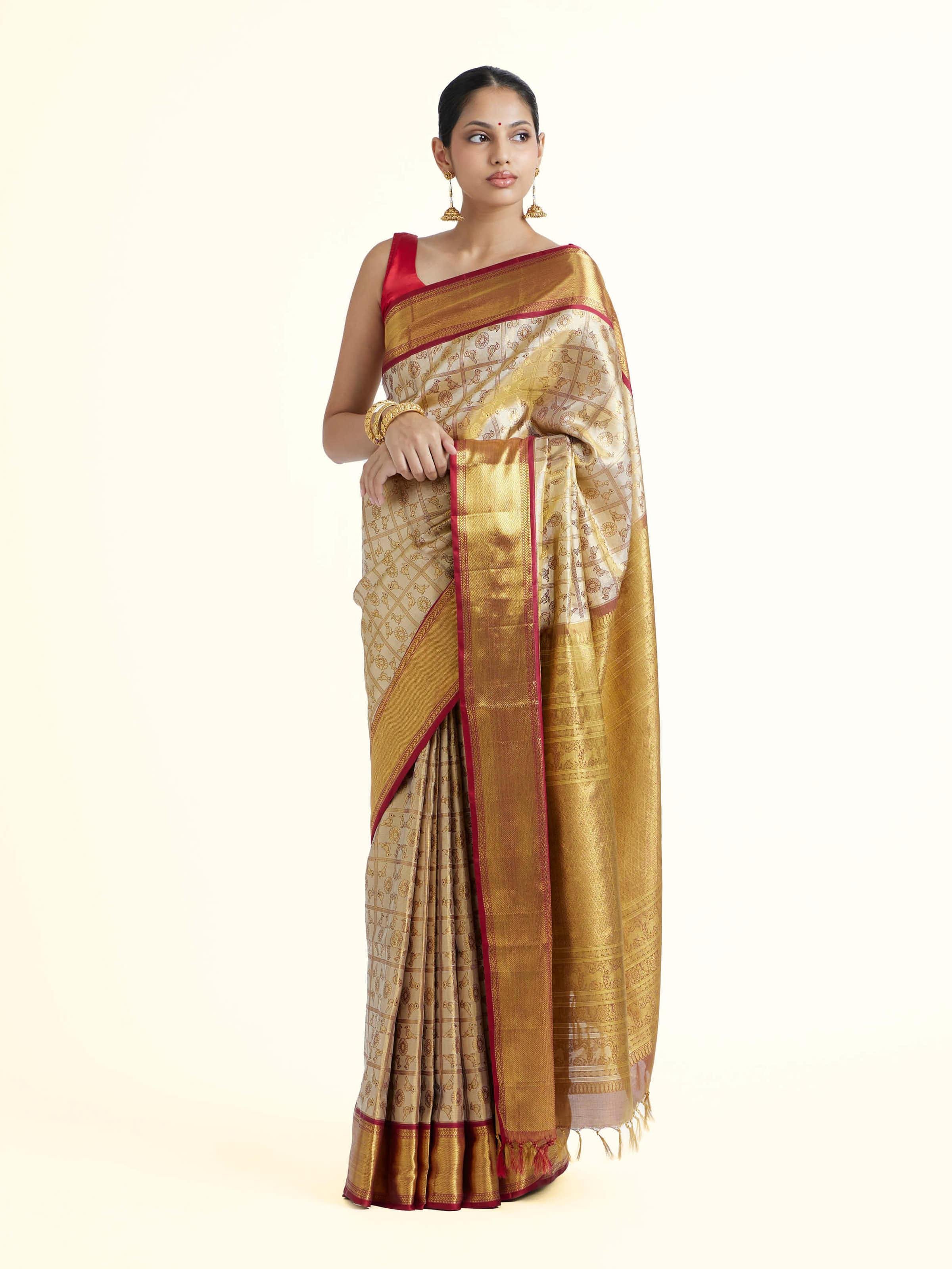 Side view of gold silk Kancheepuram saree showcasing elegant drape