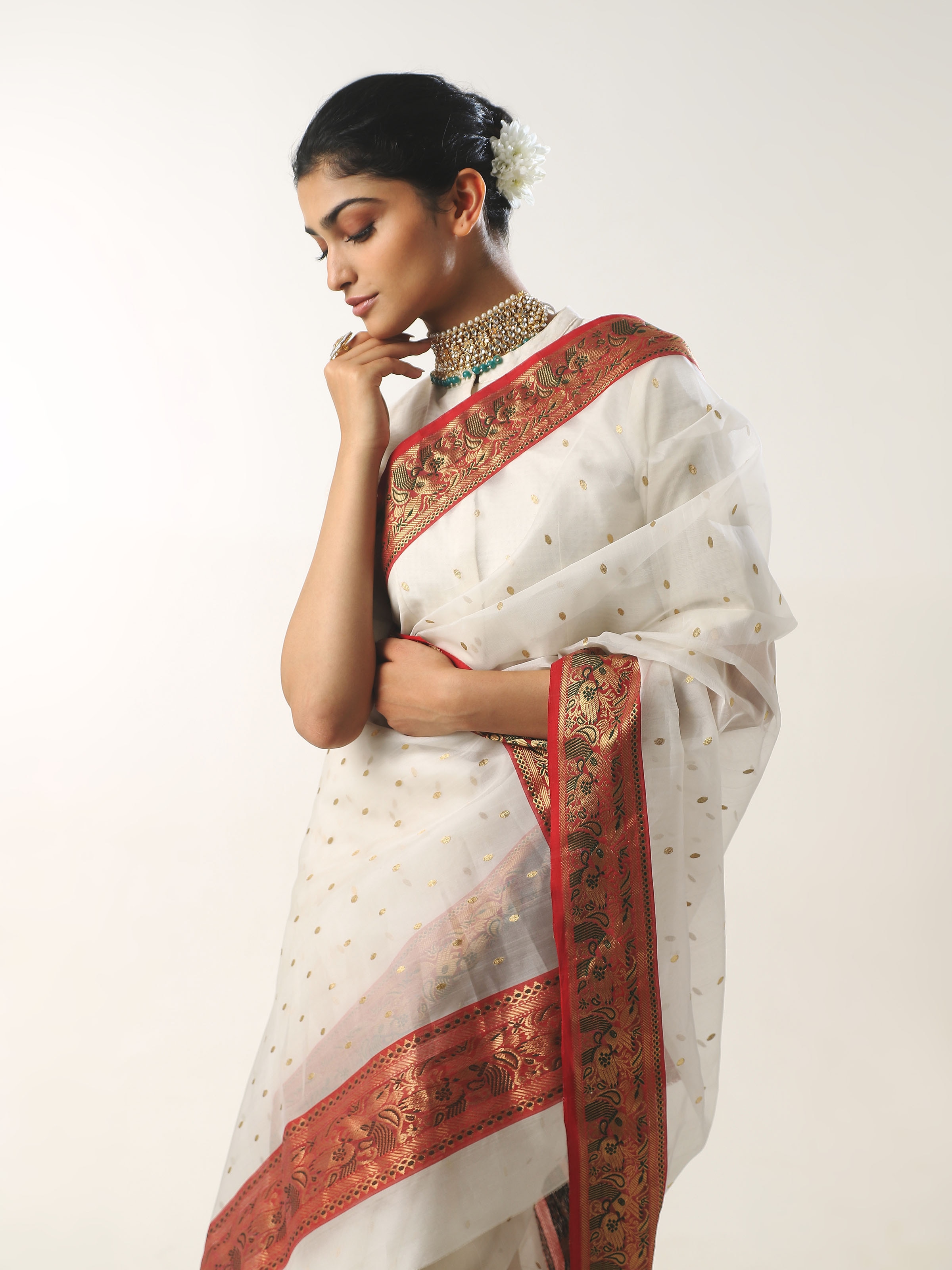 Alternate side view of white cotton silk Chanderi saree emphasizing lightweight texture
