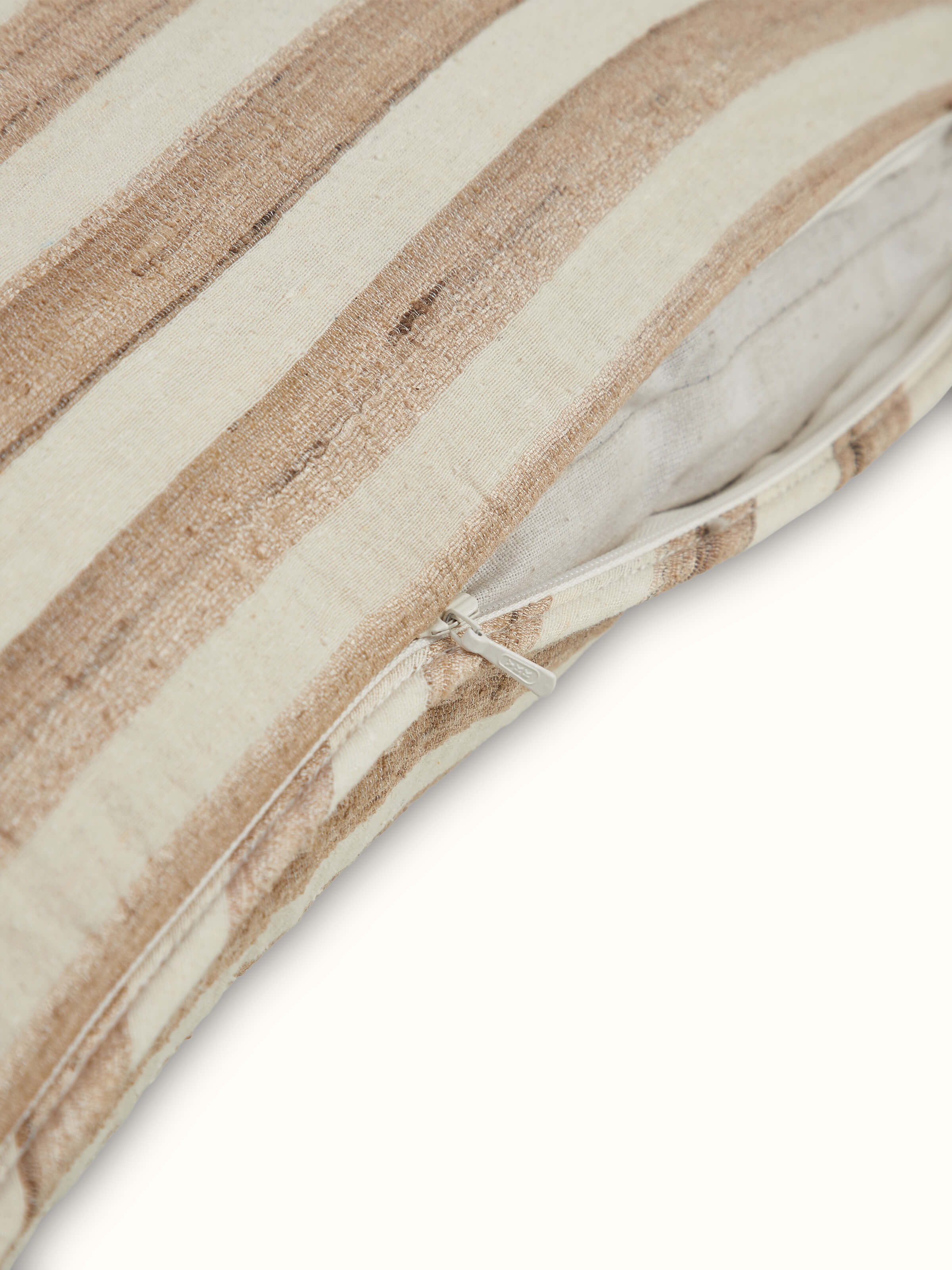 Angled shot highlighting the sheen and intricate craftsmanship of the silk handloom