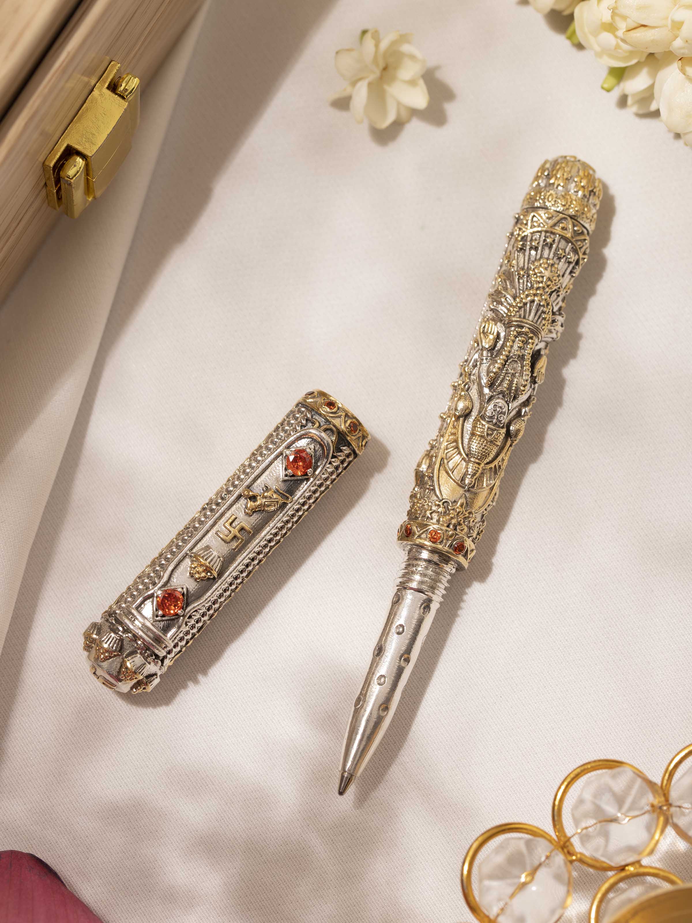 Close-up view of Lakshmi & Ganesha Silver Smithing Pen emphasizing intricate detailing by Swadesh