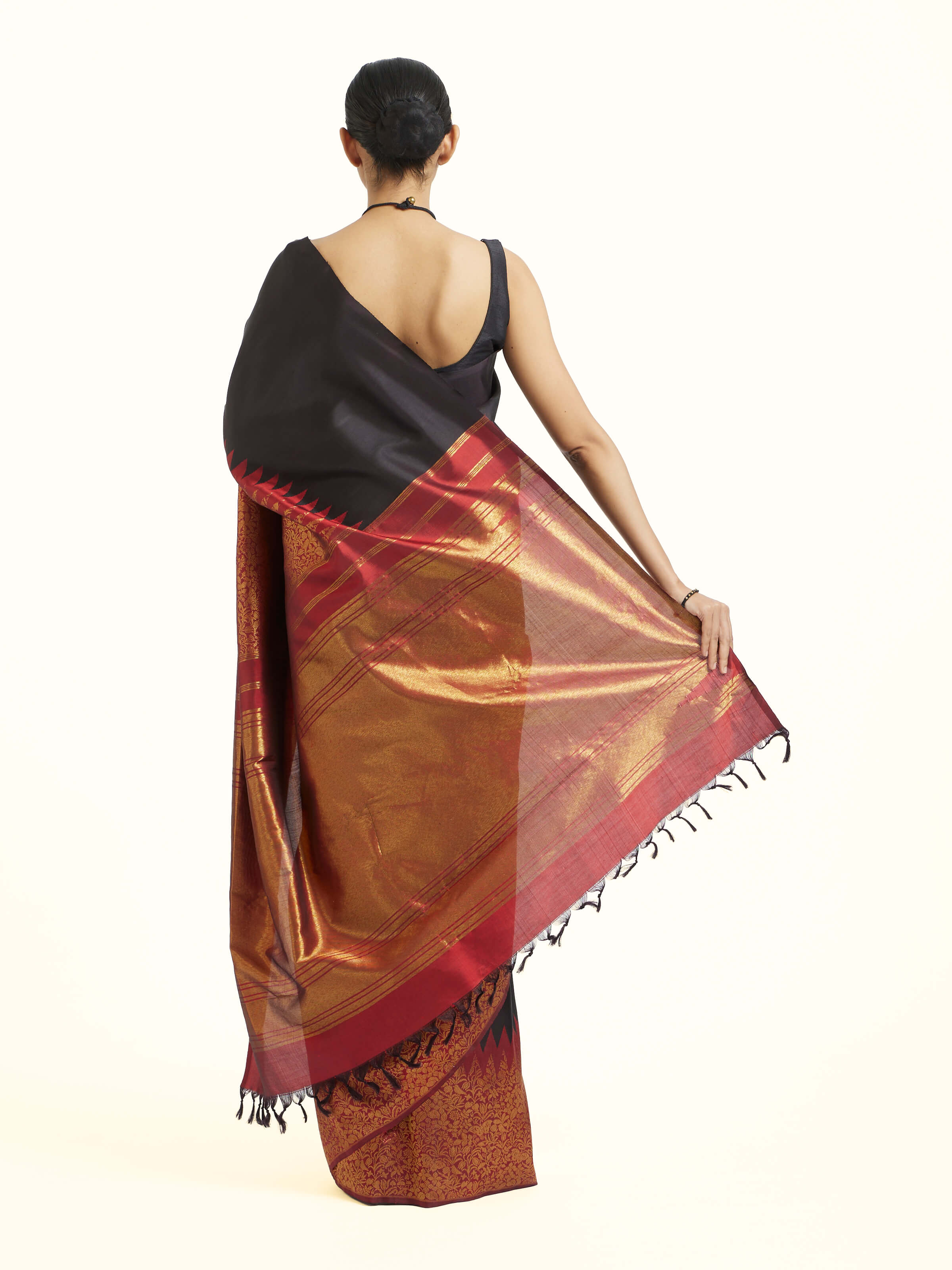 Back view of black silk Kancheepuram saree with ornate pallu design