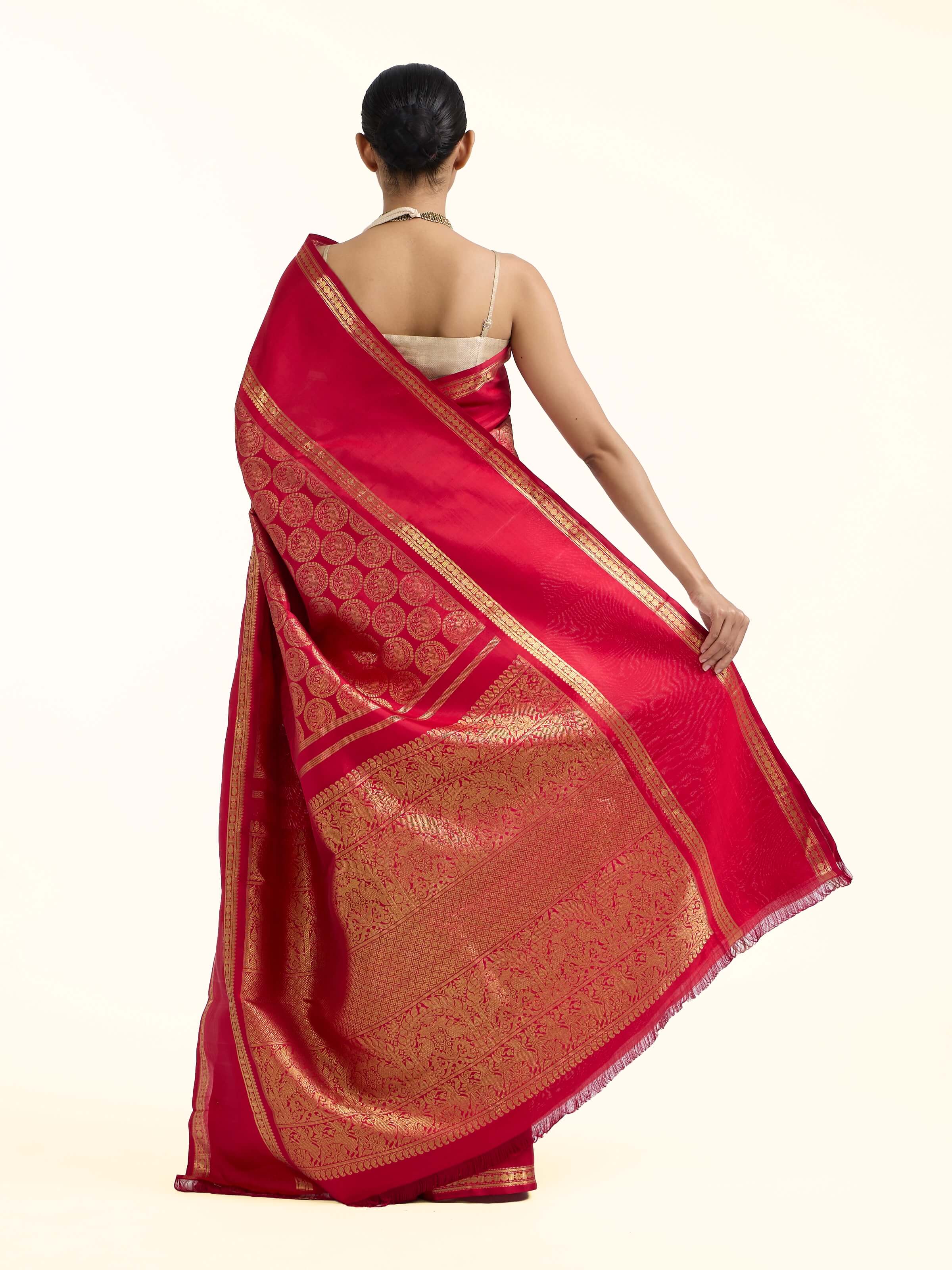 Back view of red silk Kancheepuram saree with ornate pallu design