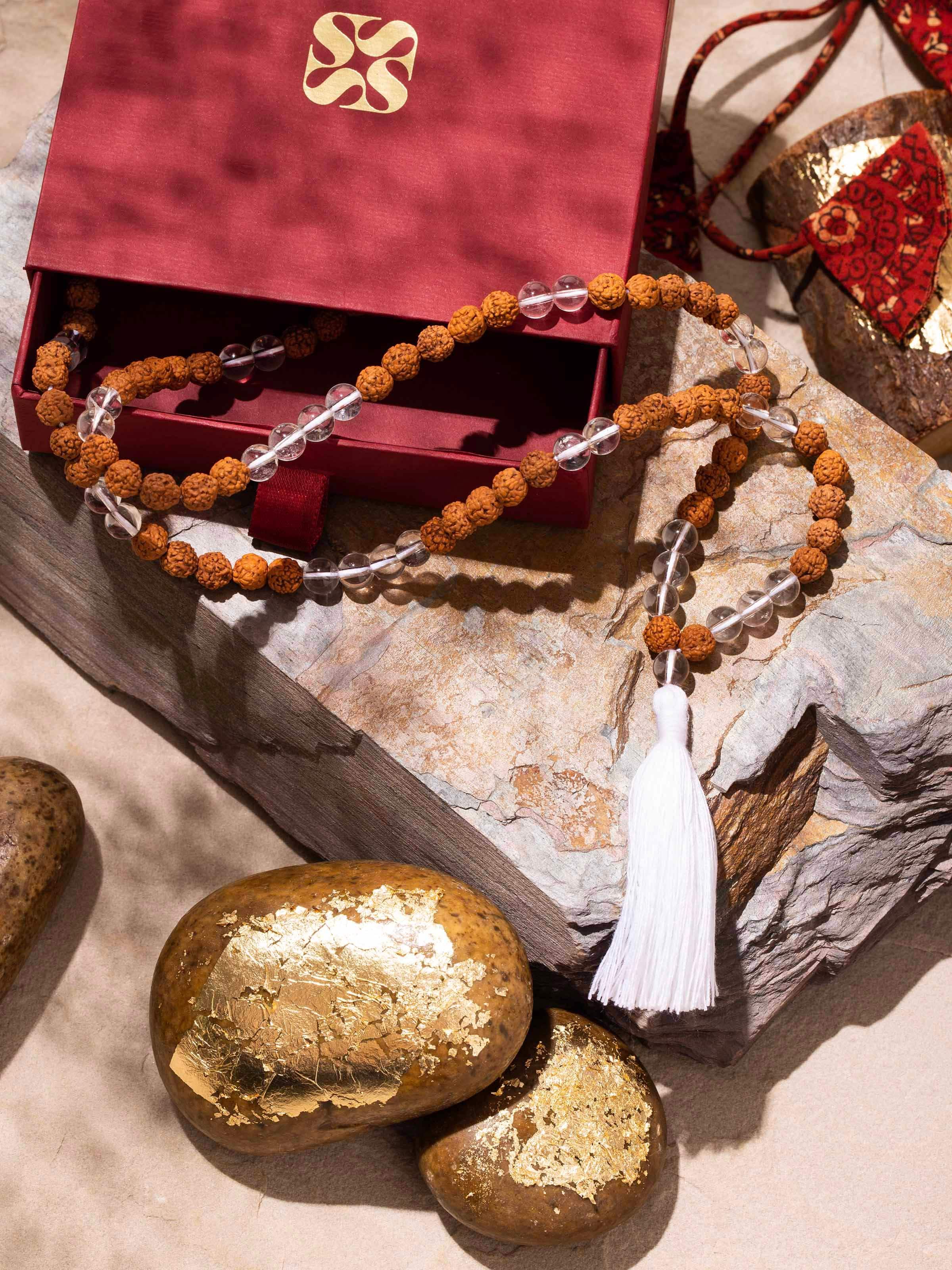 Lifestyle image of Rudraksha & Sphatik Mala styled for spiritual or daily wear aesthetics