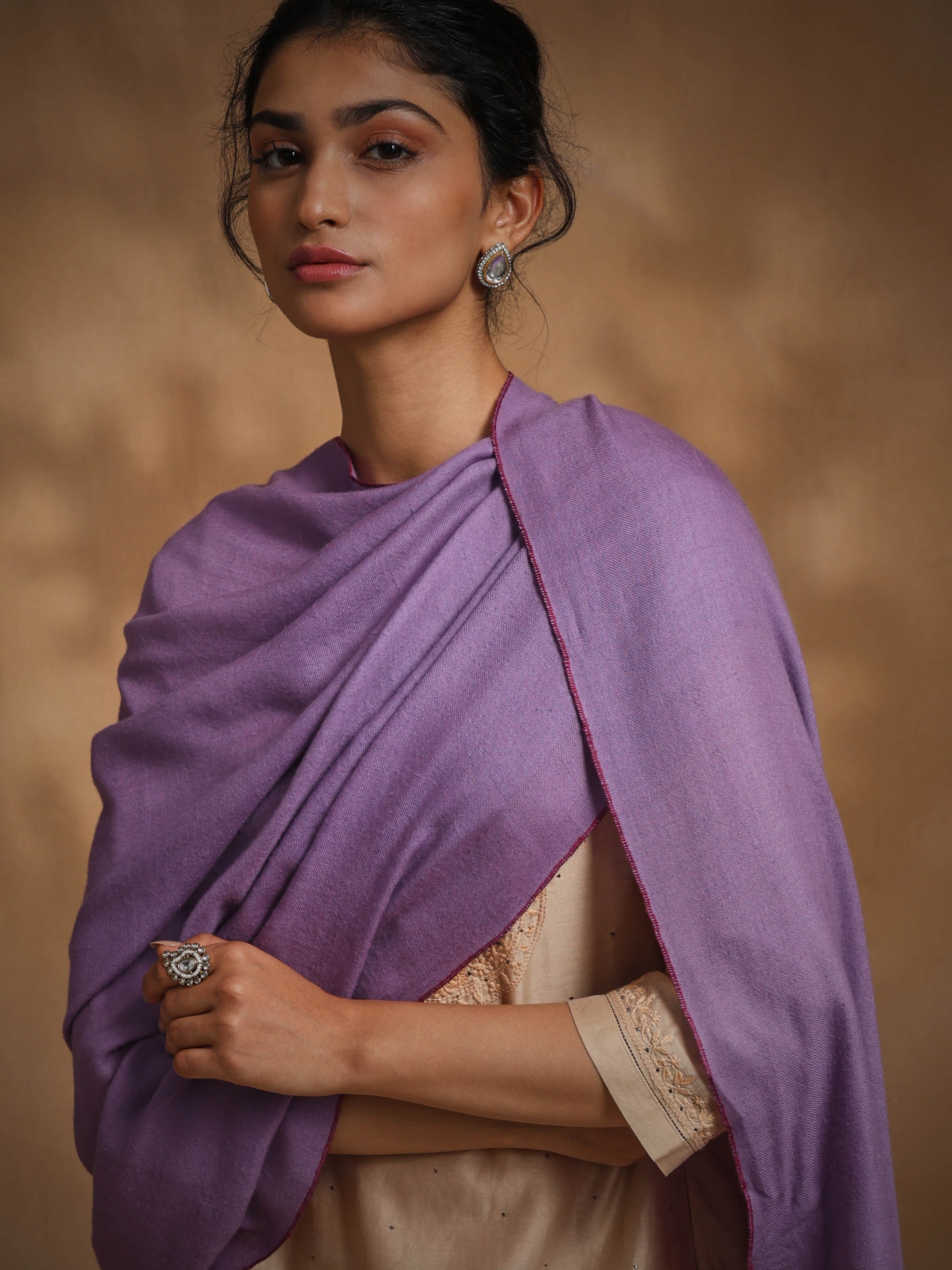 Detail view of purple cashmere kaaj embroidered handwoven stole showcasing craftsmanship