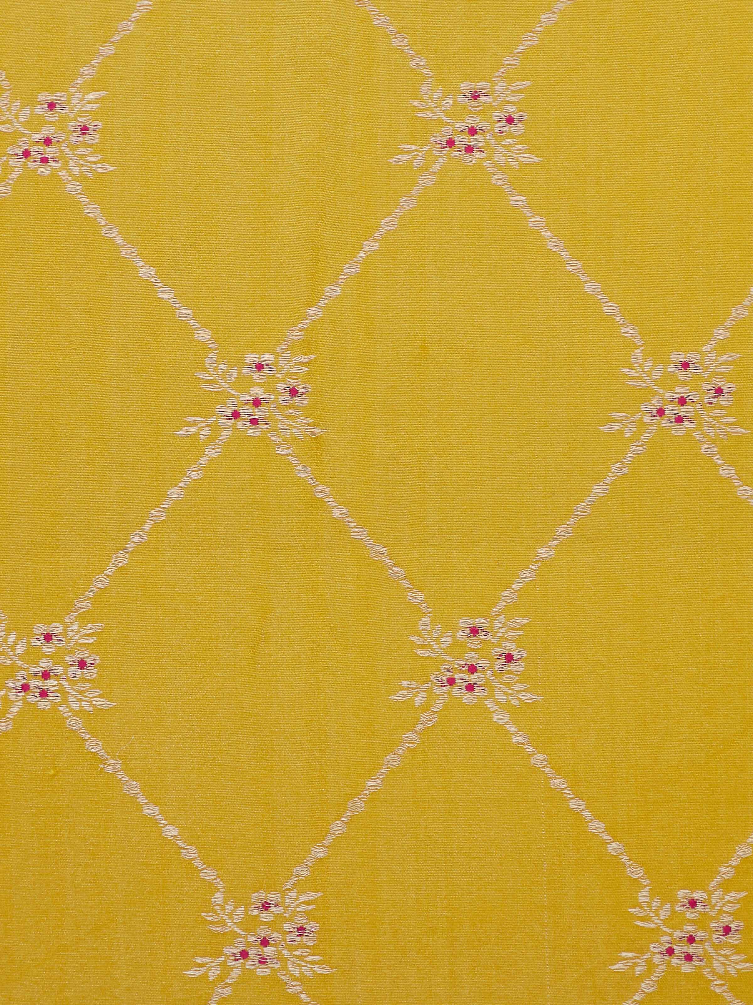 Detailed side view of ornate weaving and bright silk finish.