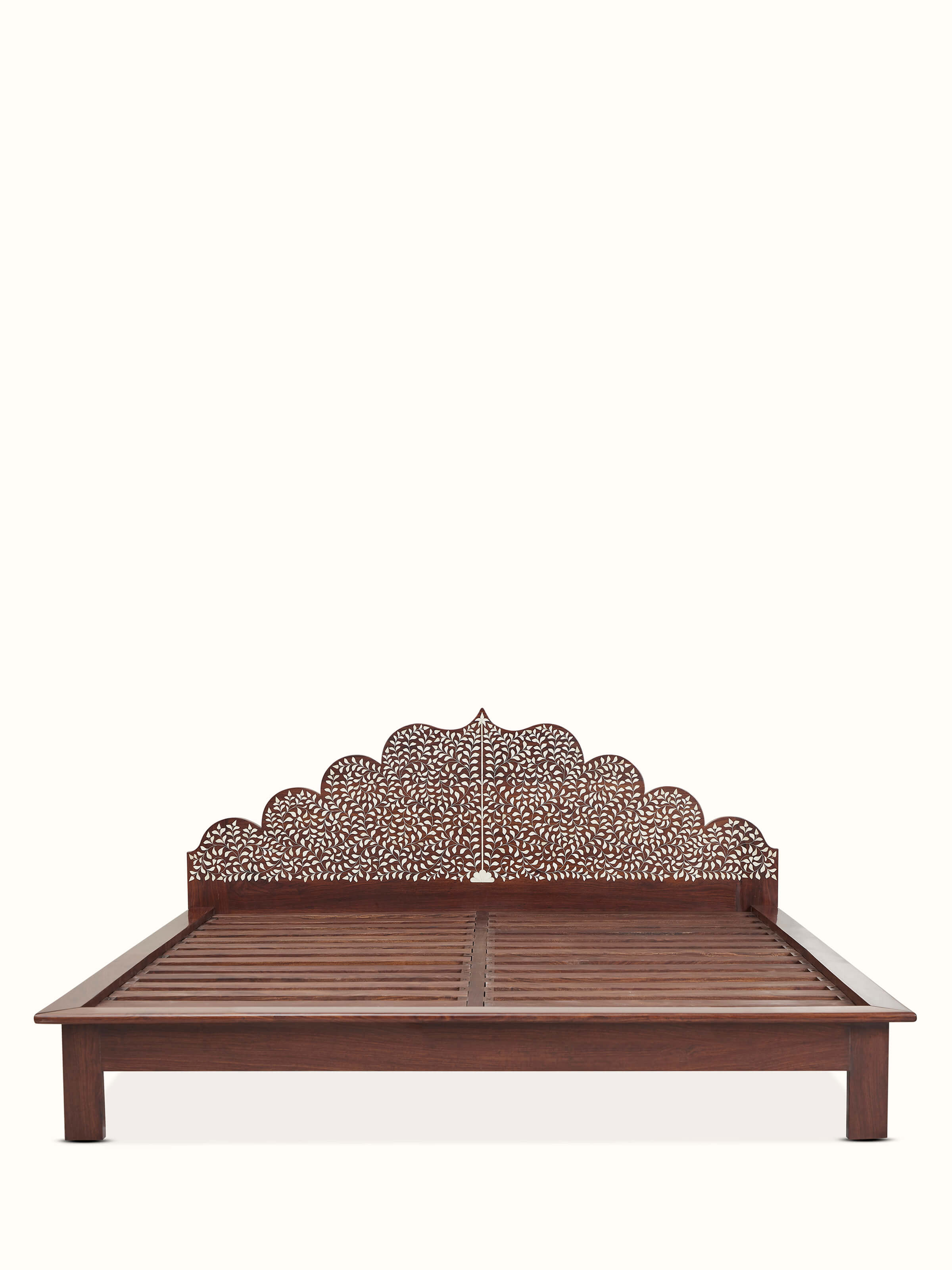 Front view of Sheesham wood & bone inlaid king size bed, showcasing intricate inlay work and luxurious finish.