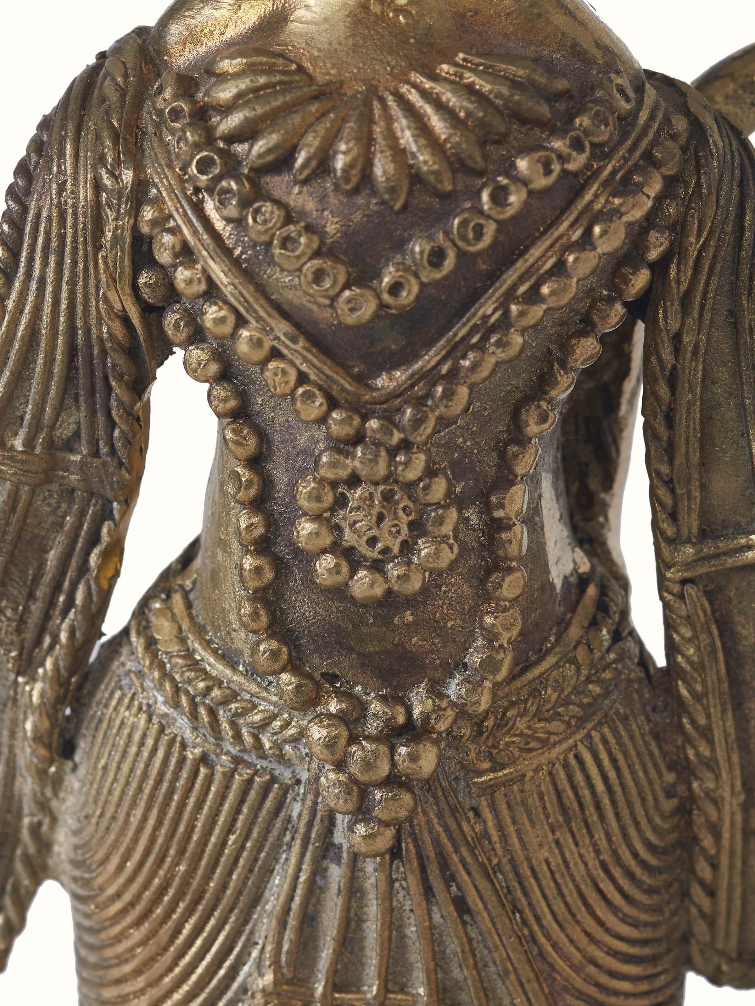 Close-up view of Dokra brass Hanuman Ji idol highlighting handcrafted texture