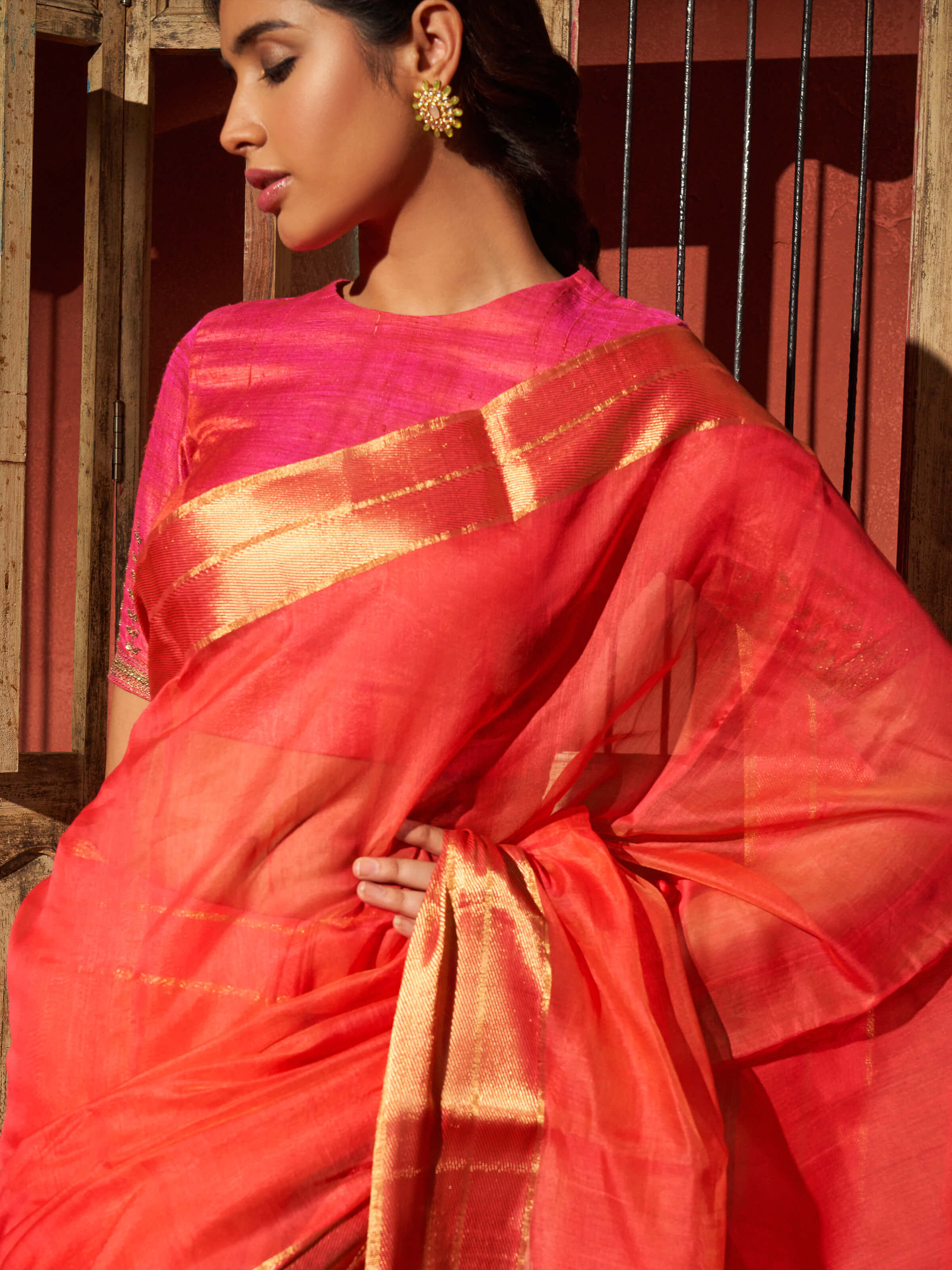Detail view of coral mulberry silk Chanderi saree showing fabric weave
