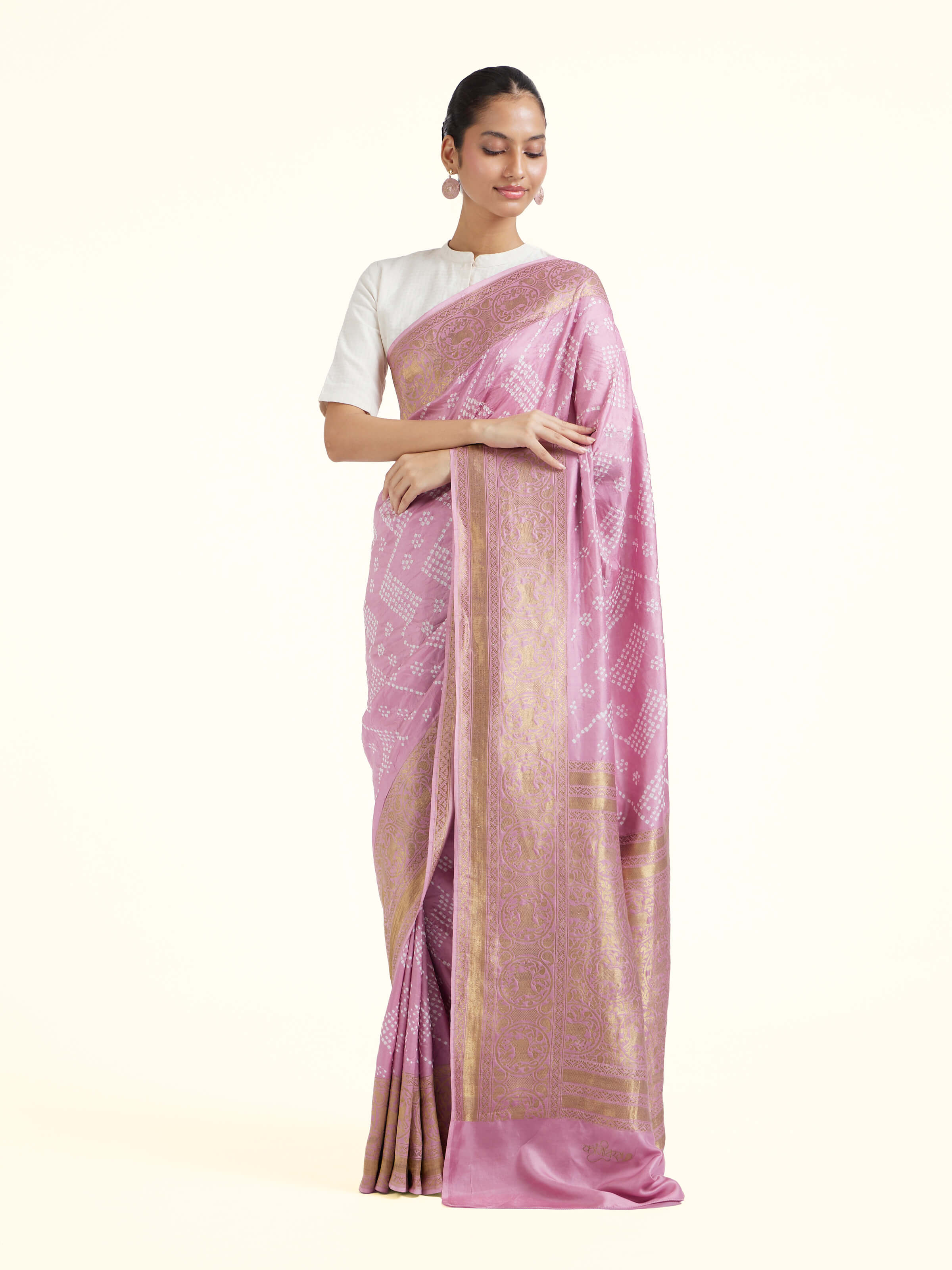 Side view of lavender silk tie and dye Bandhani saree highlighting fluid drape