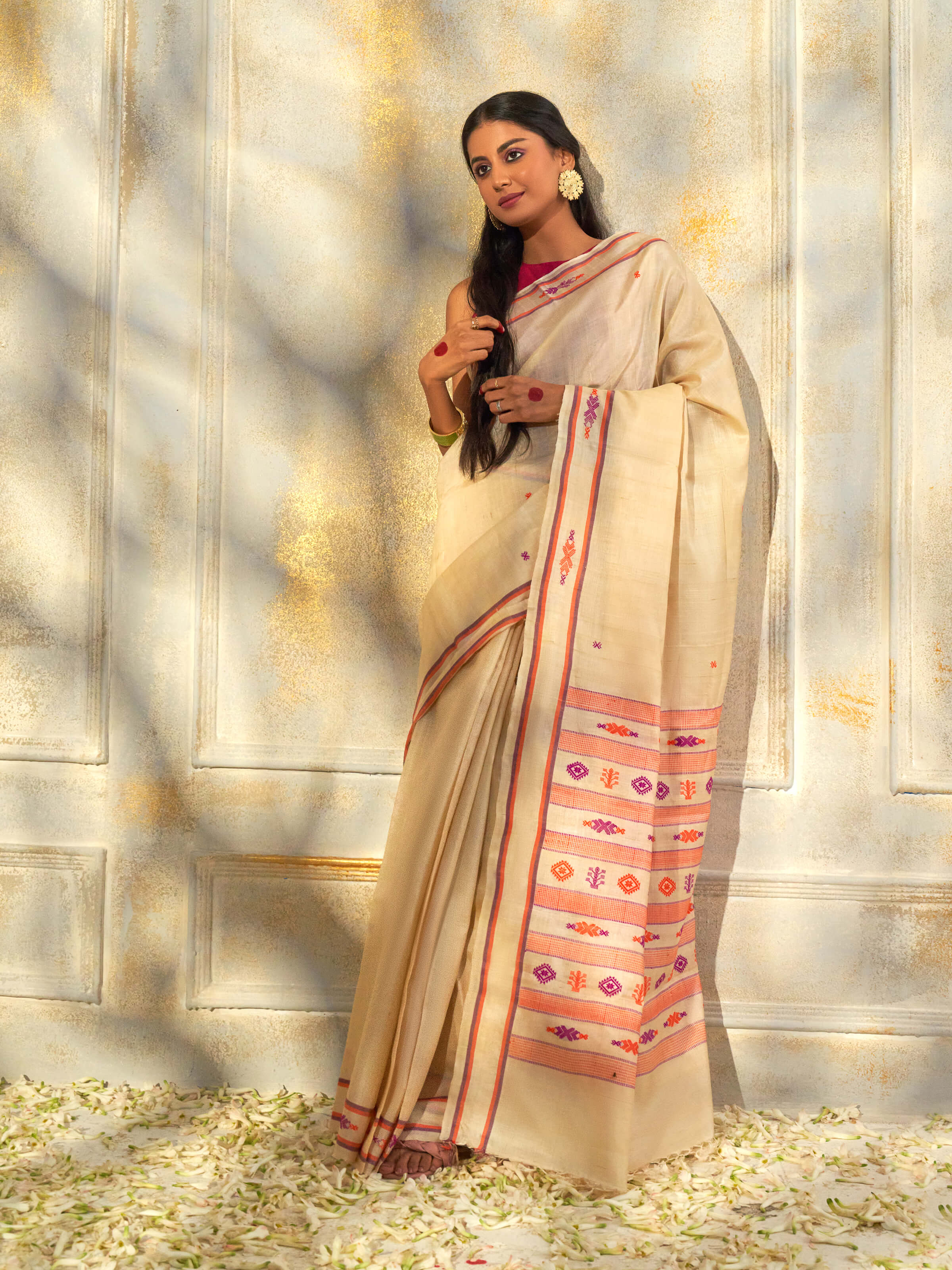 Angled view of off-white Tussar silk saree emphasizing natural weave and finish