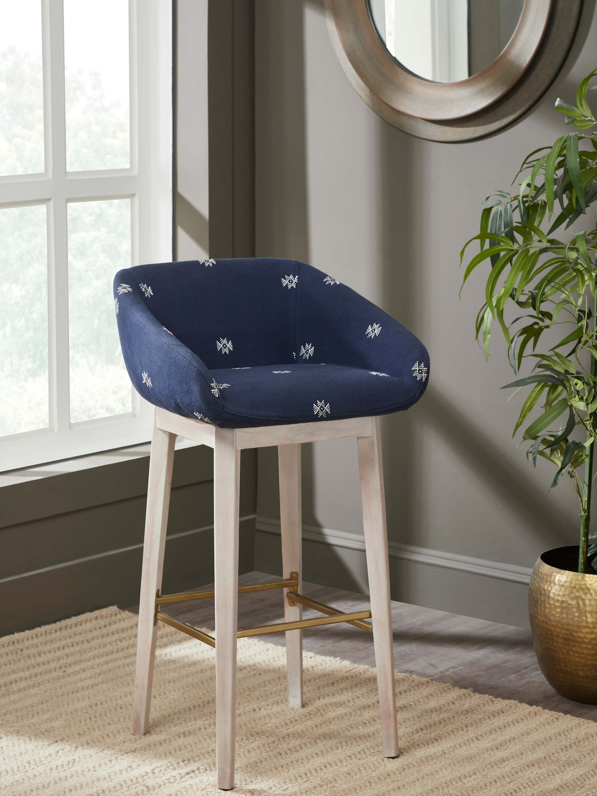 Side view showcasing the upholstered acacia wood bar chair design.