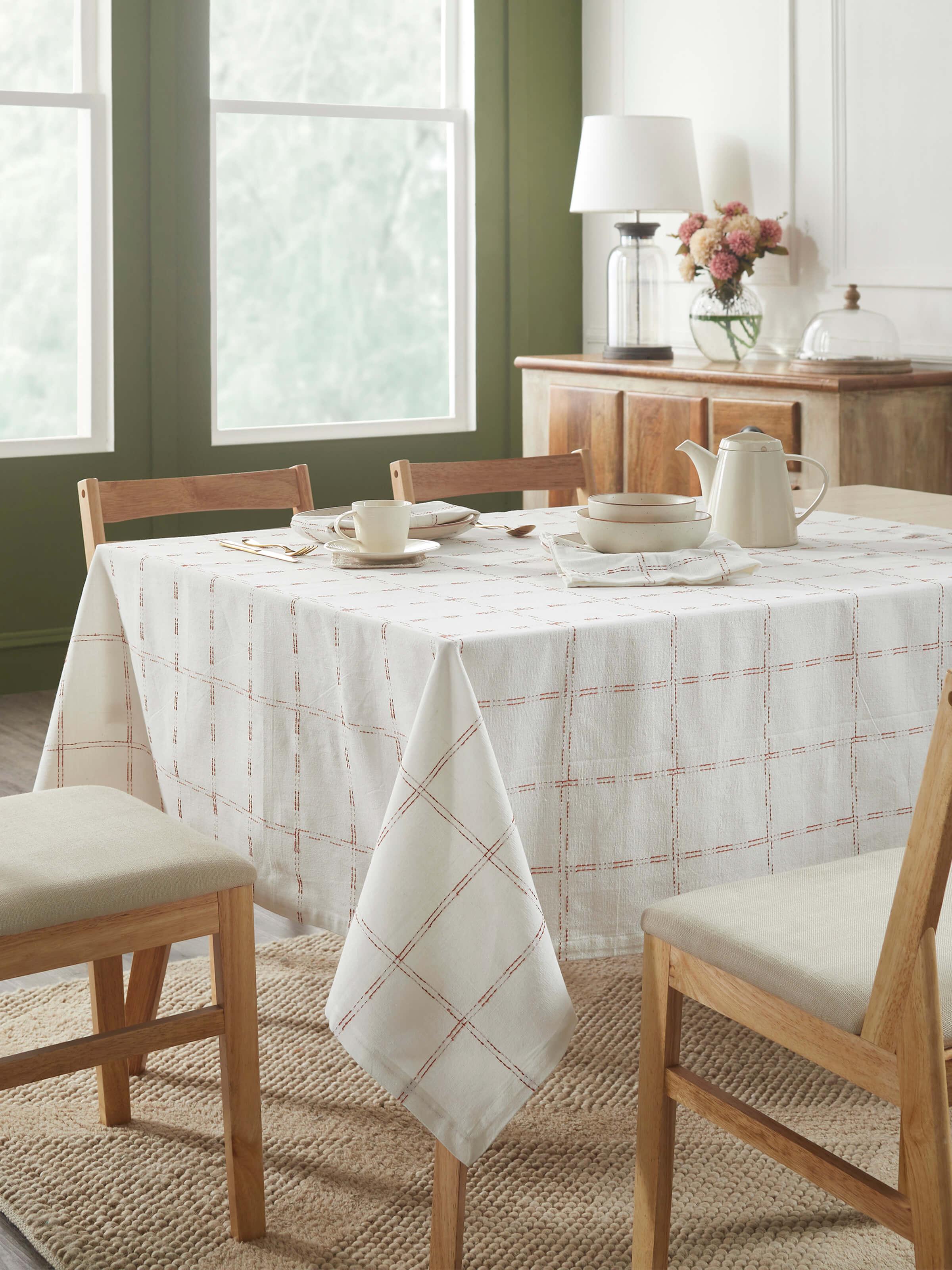 Top view presenting the full layout and checkered design of the table cover