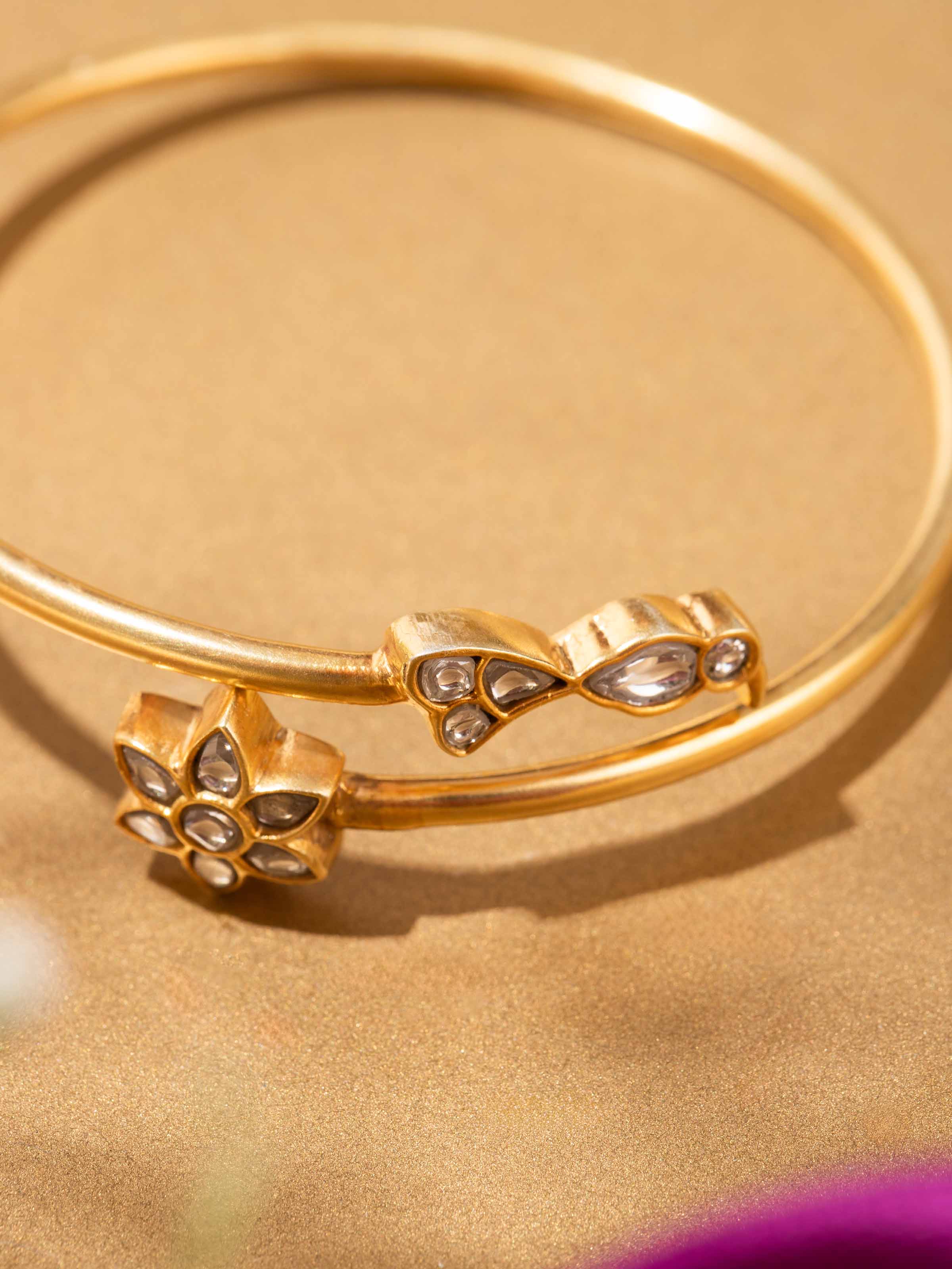 Artistic shot highlighting the bracelet’s shine and elegant silver pattern