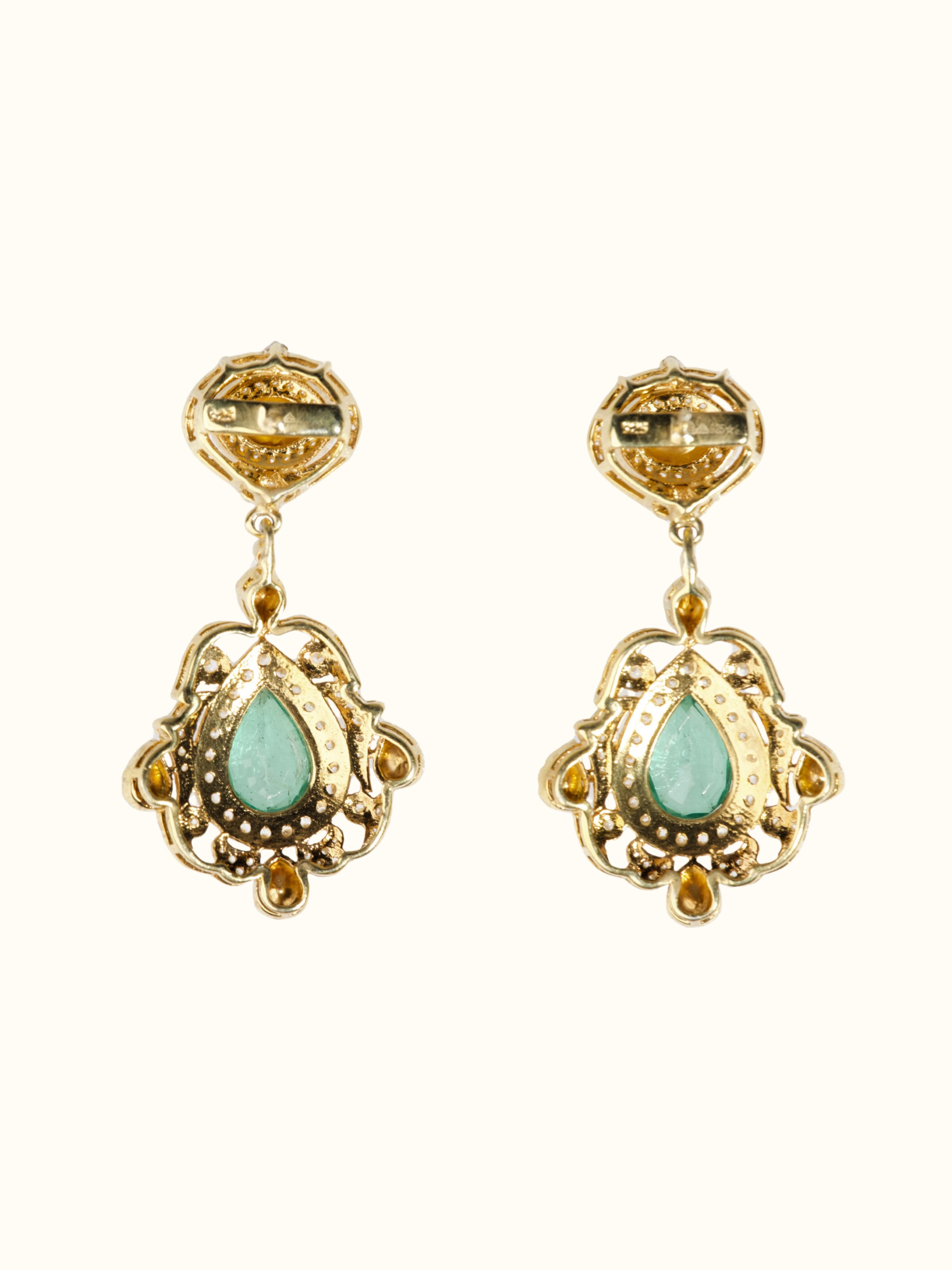 Back side view of silver smithing drop earrings