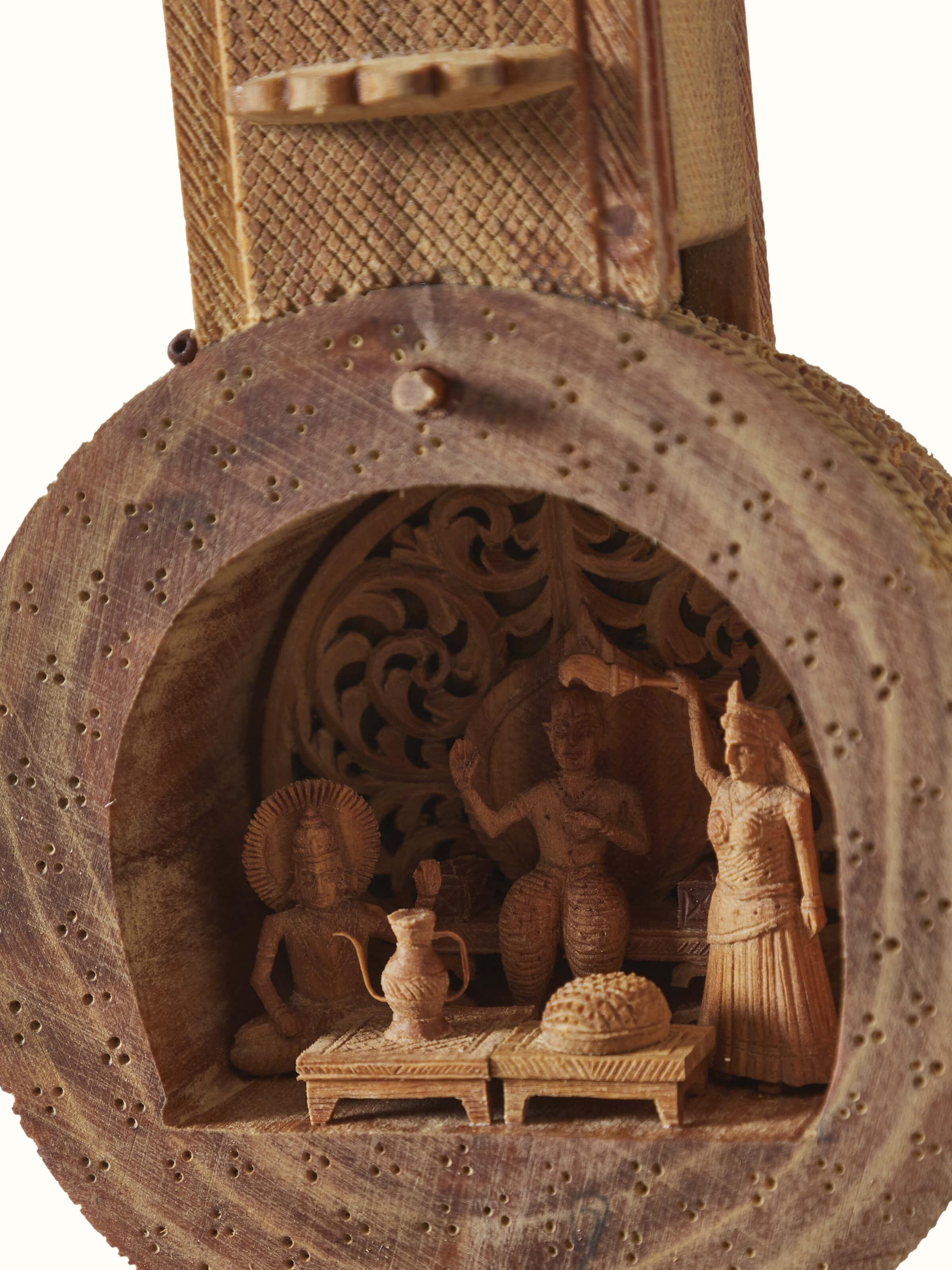 Comprehensive view of carved sandalwood devotion veena sculpture, focusing on the overall artistry and craftsmanship.