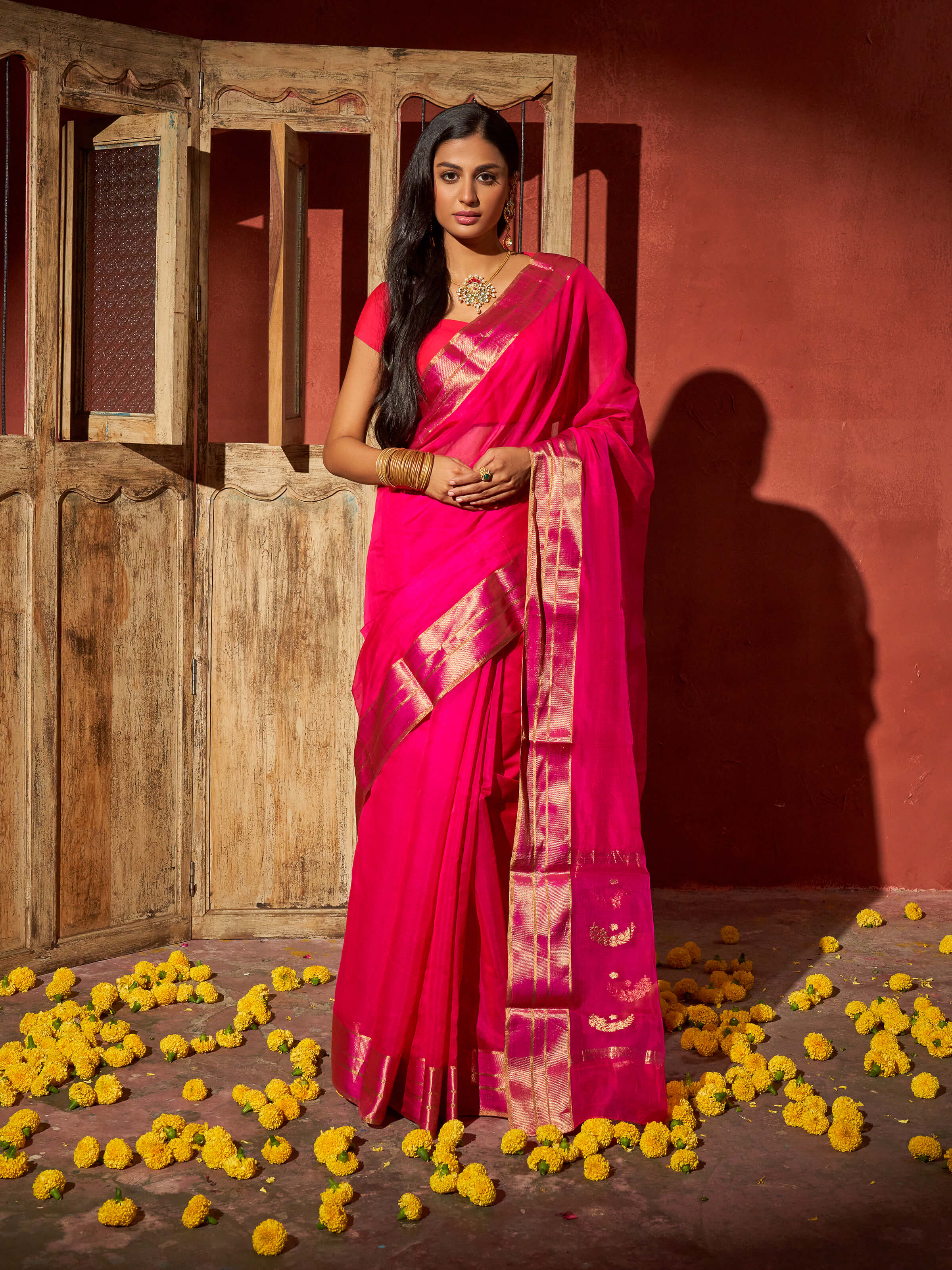 Side view of yellow cotton silk Chanderi saree showcasing light drape