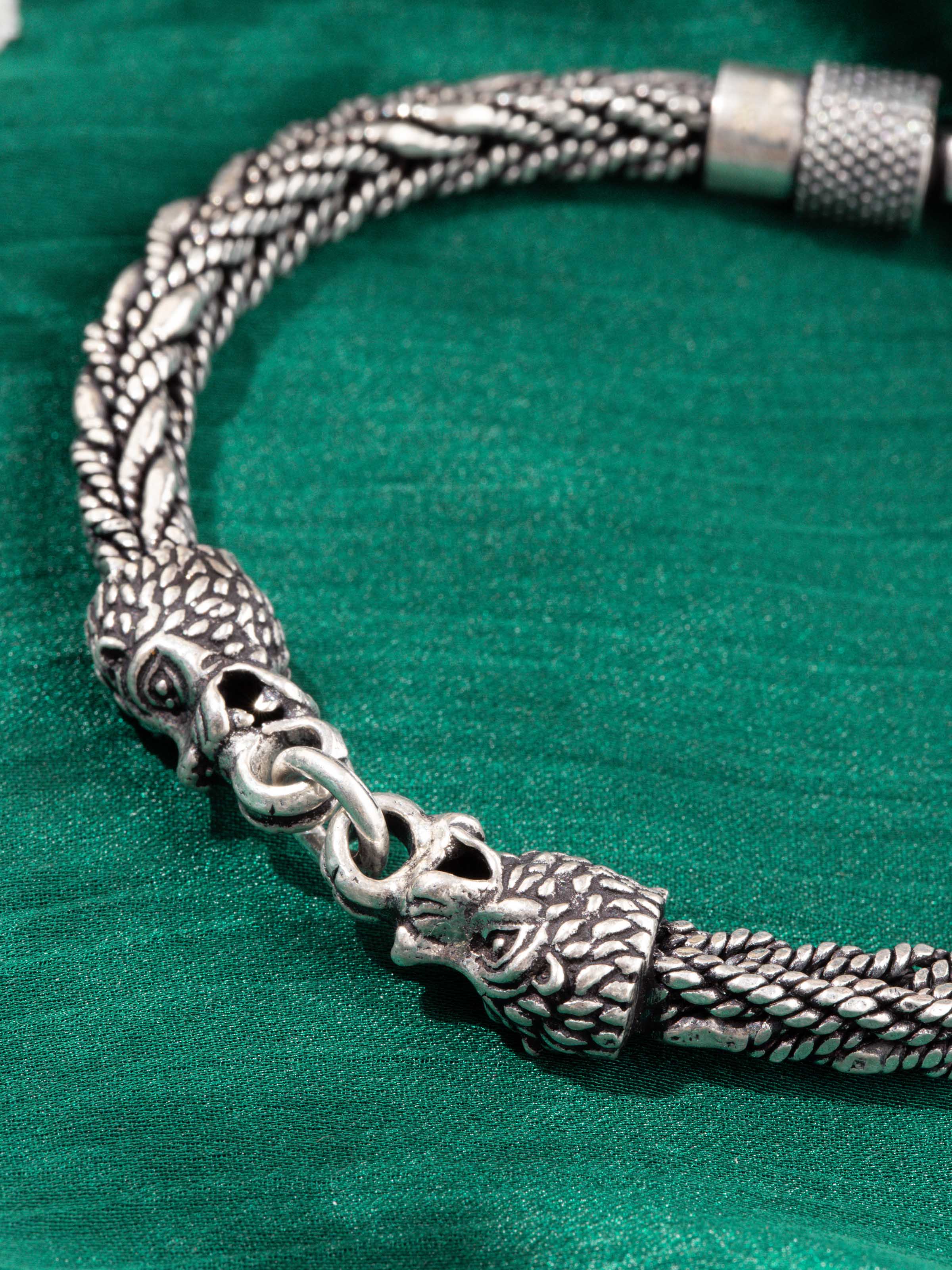 Lifestyle side angle showcasing the silver smithing bracelet worn with a minimal outfit for an elegant look.