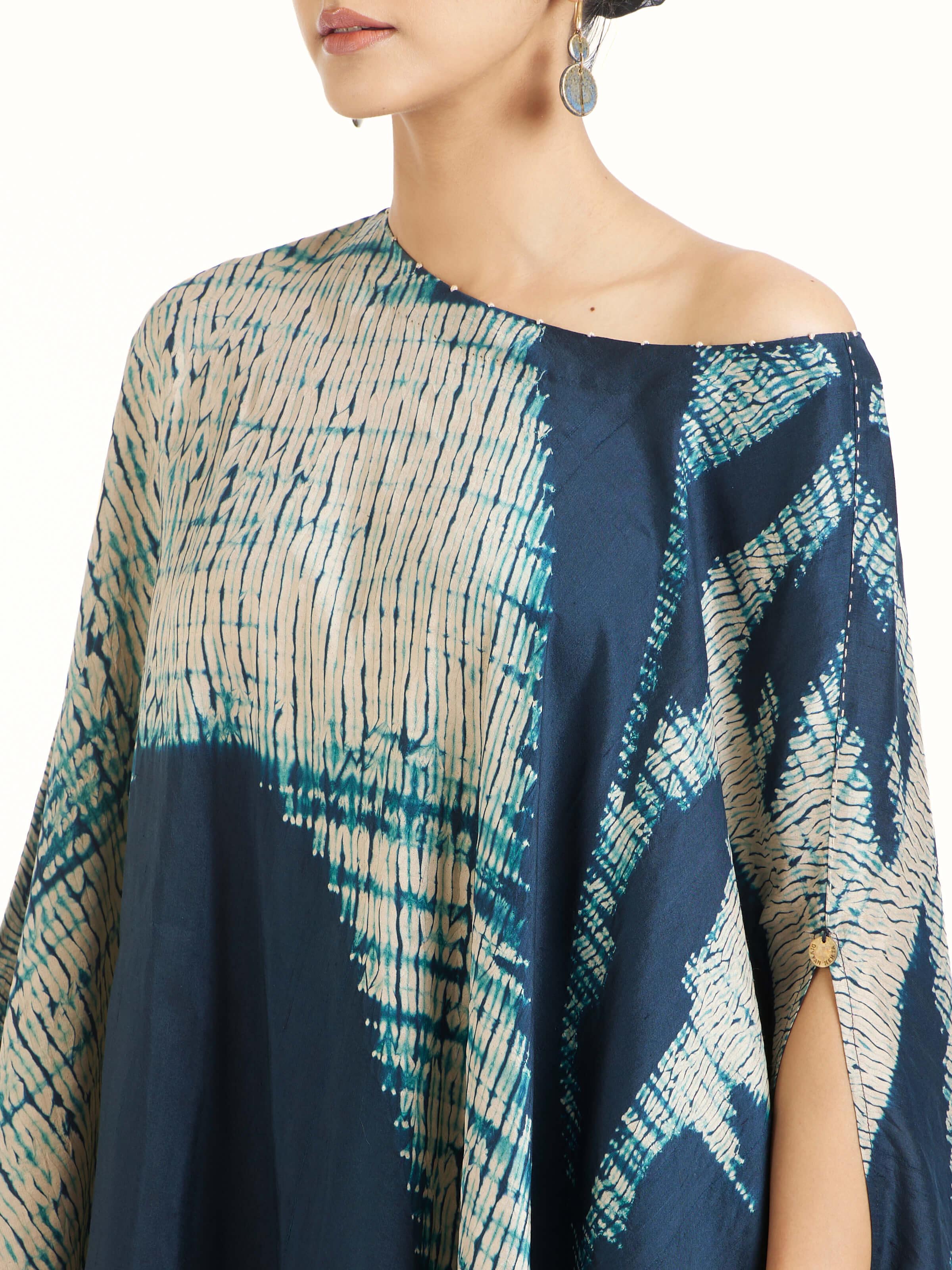 Detail view of blue silk Shibori co-ord set showing fabric texture and dye patterns