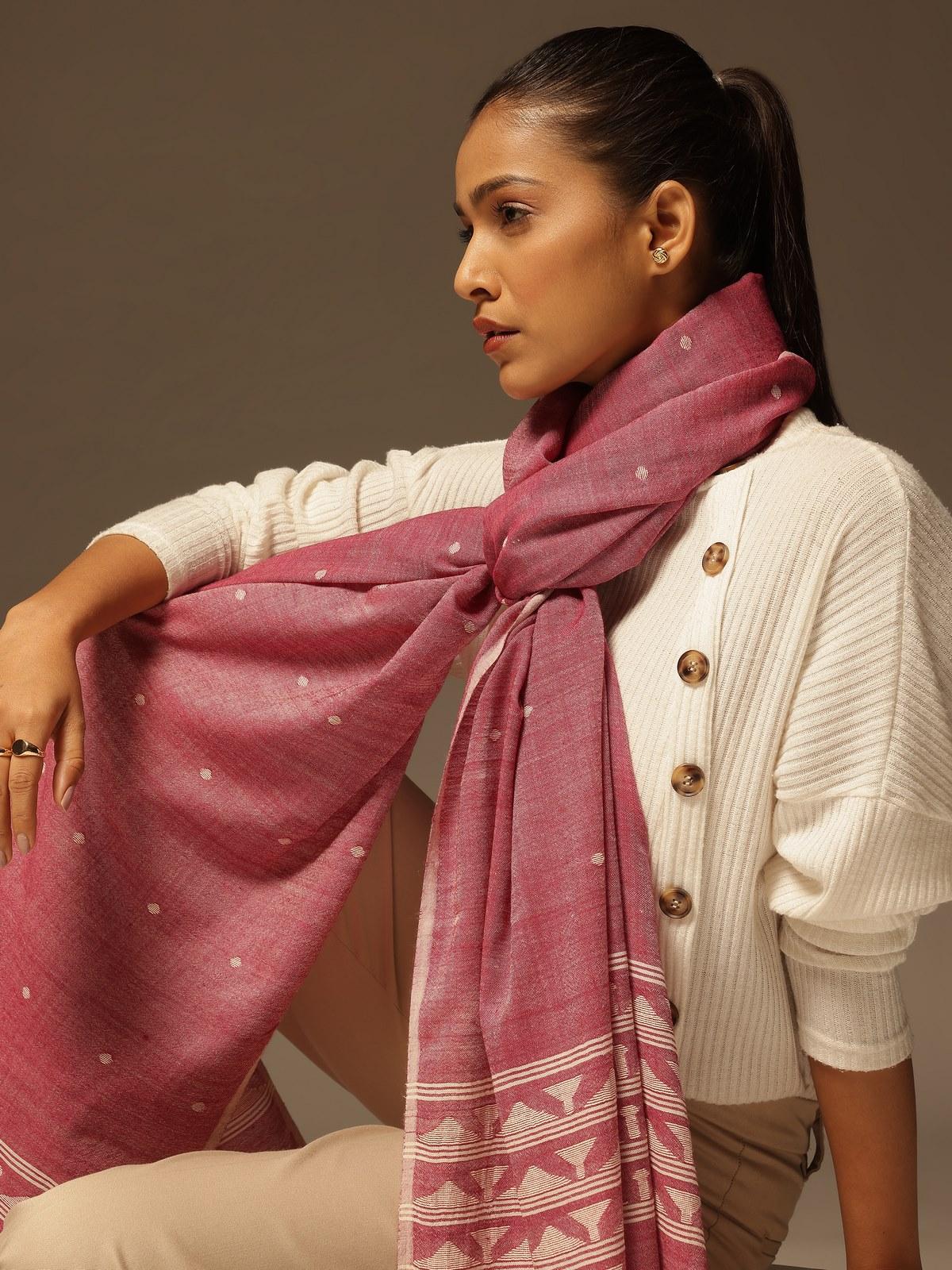 Alternate lifestyle view of maroon shawl highlighting its handwoven detailing and warmth.