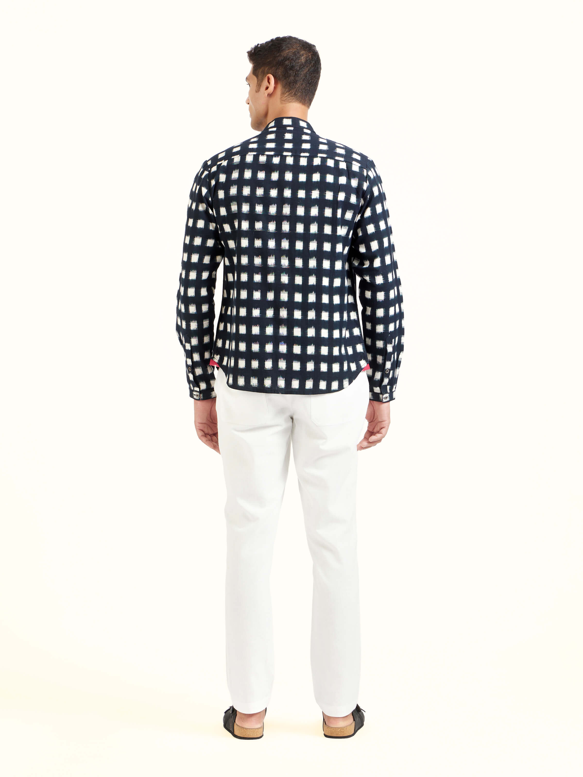 Back view of black cotton Telangana Ikat shirt displaying full design