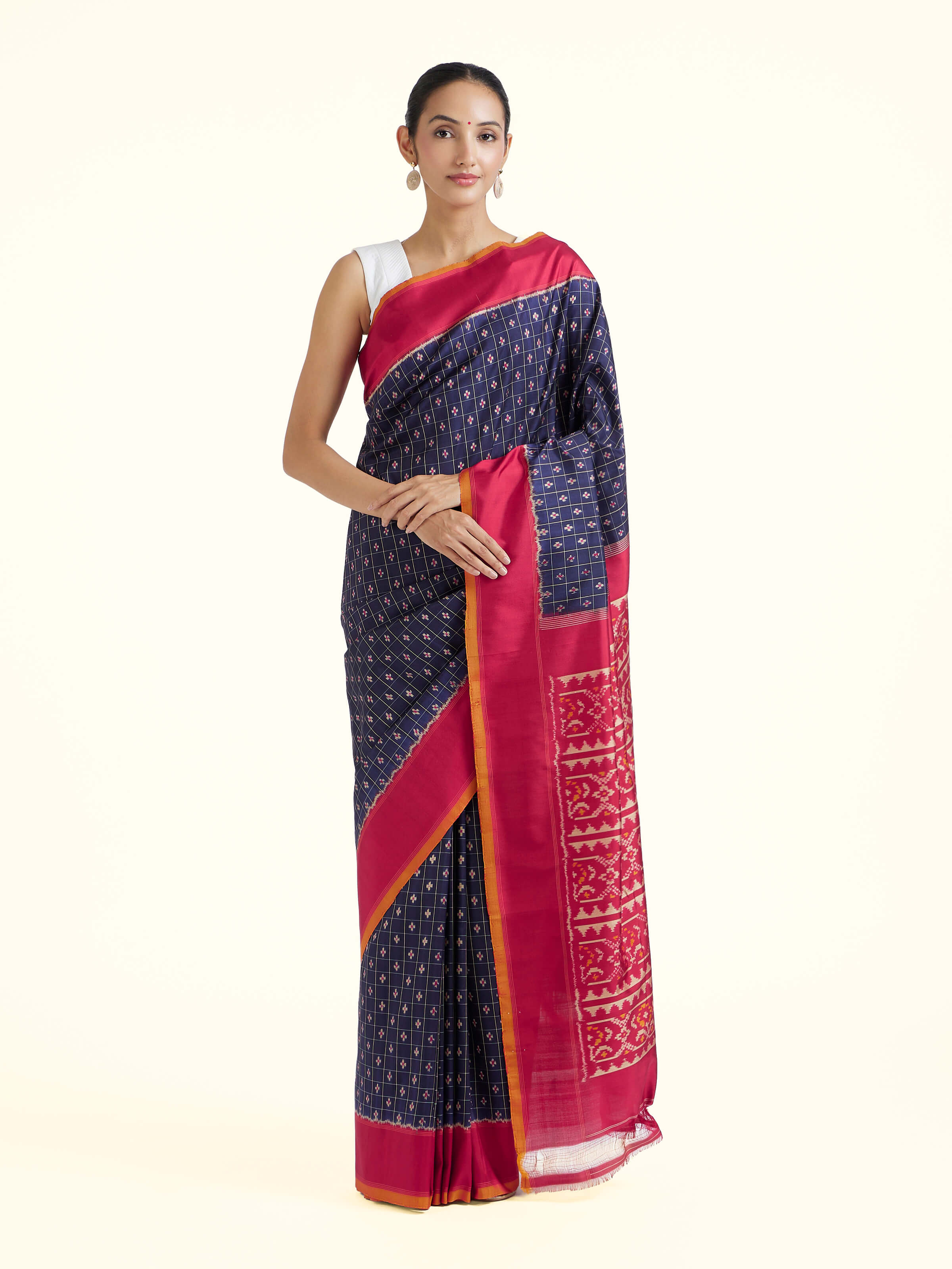 Front view of navy mulberry silk Ikat saree showcasing deep tone and Ikat patterns