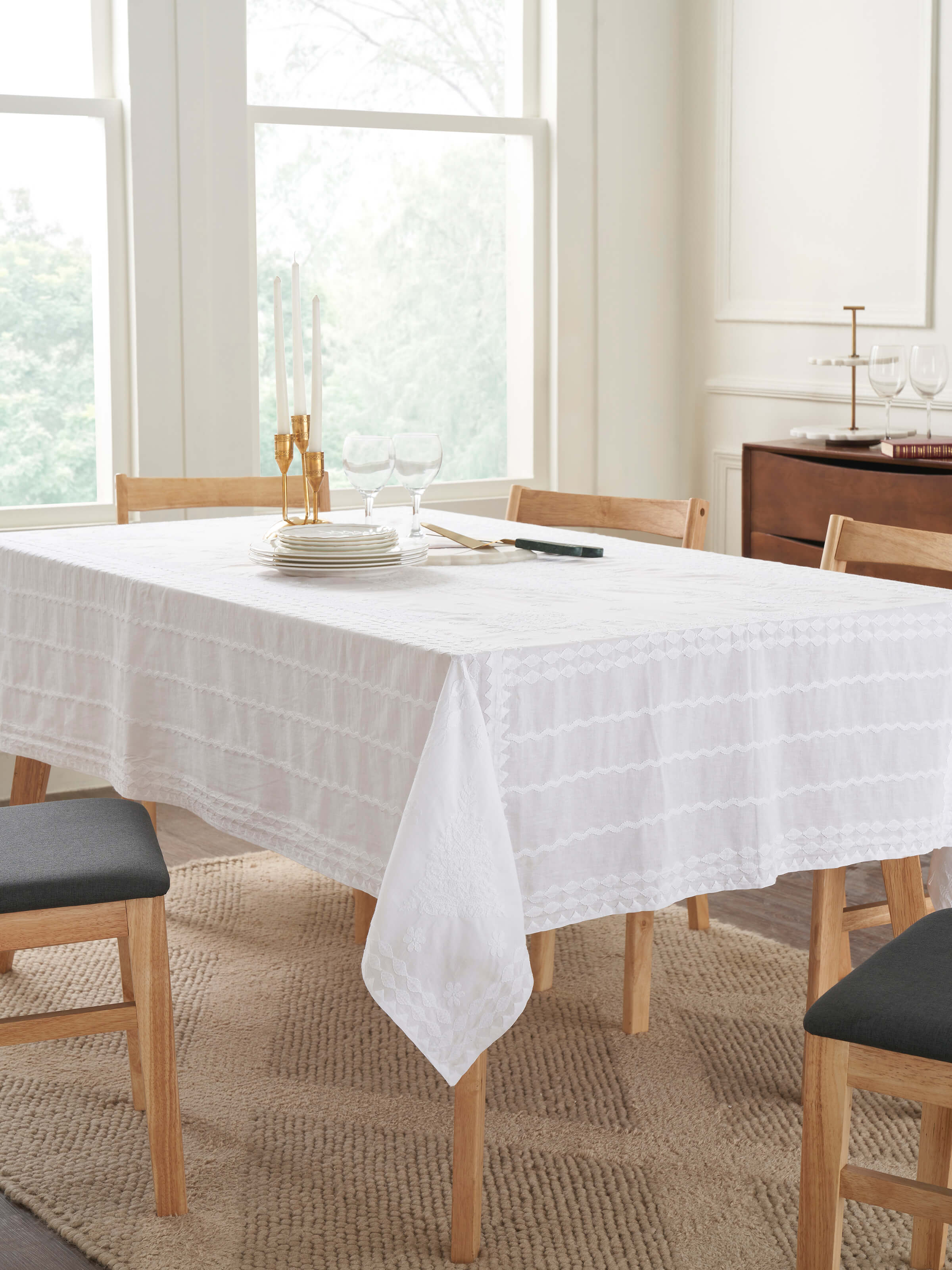 Top-down shot highlighting the fine embroidery patterns and cotton fabric texture