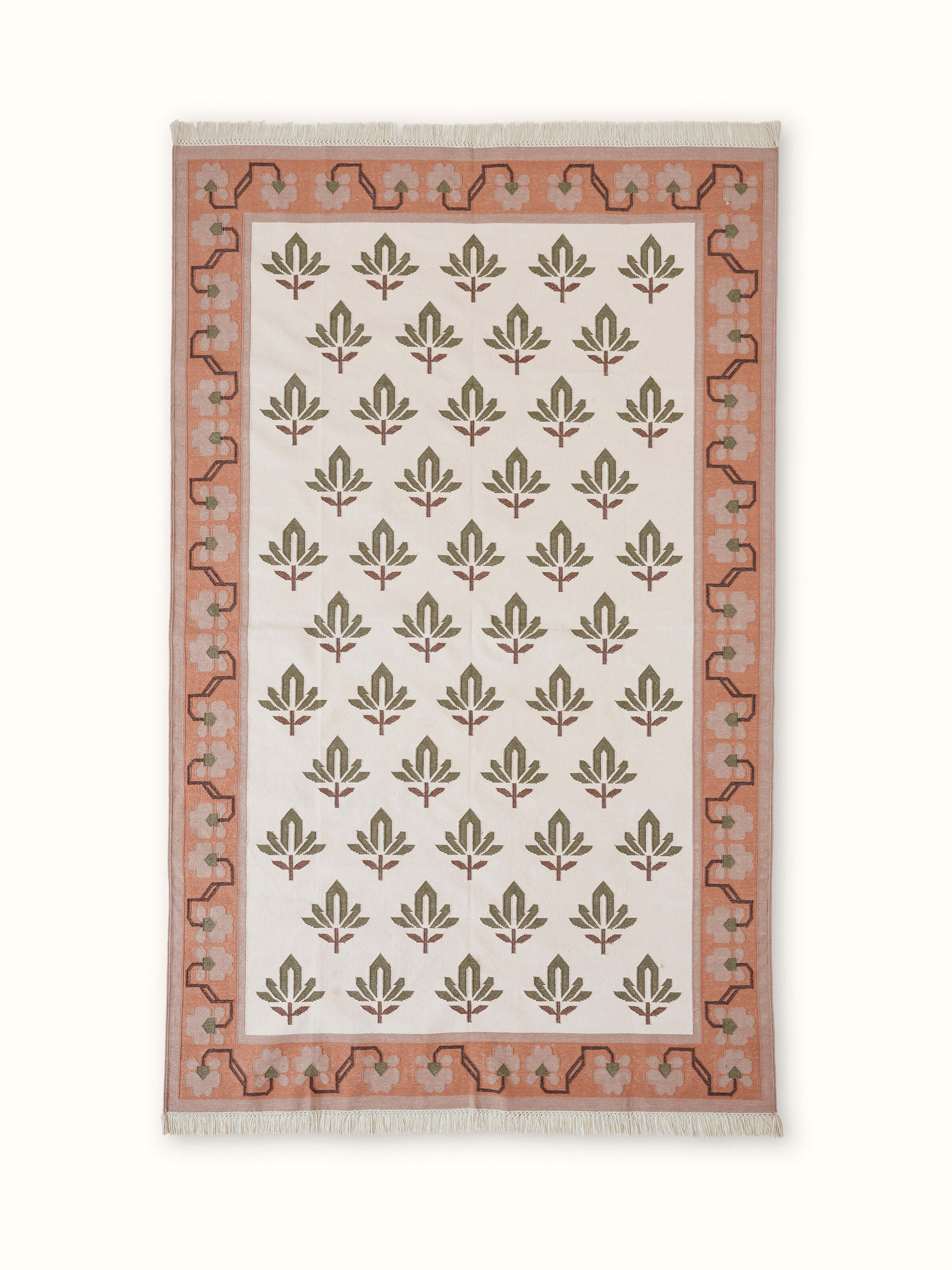 Front view of Contemporary lotus blush lawan cotton panja dhurrie, featuring its soft blush color and intricate lotus pattern.