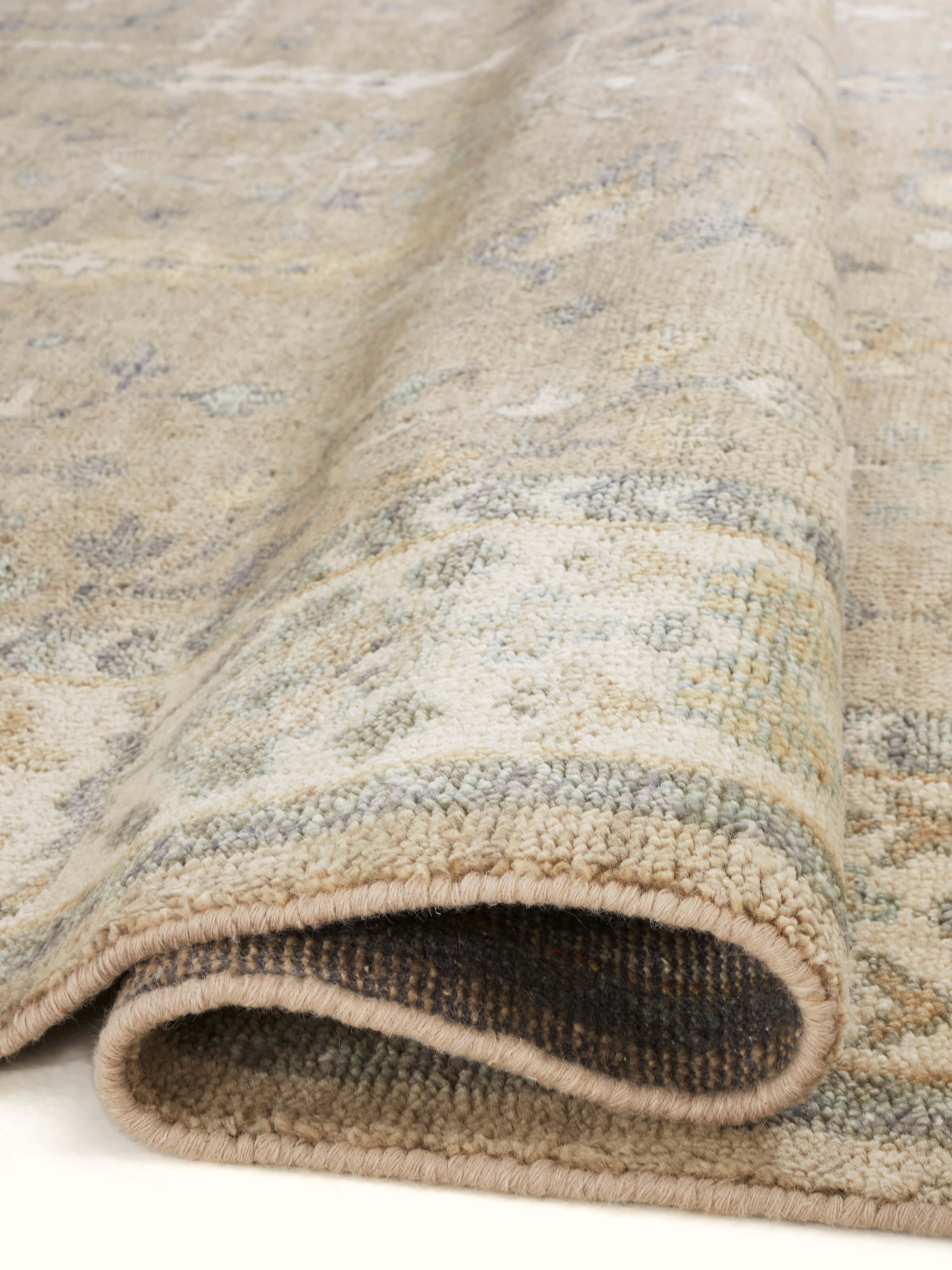 Side perspective highlighting the thickness and weave quality of the rug