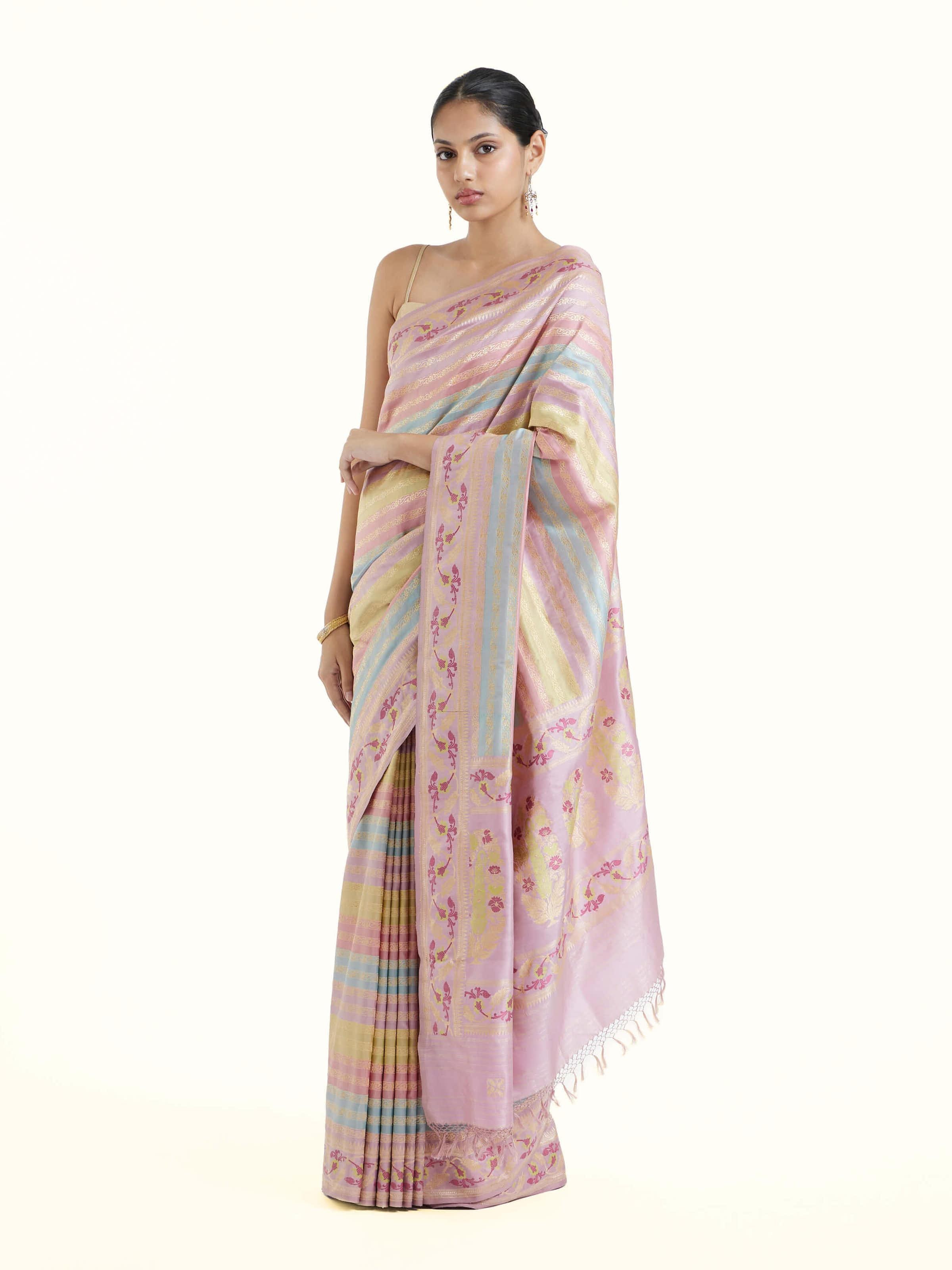 Side view of silk rangkat Banarasi saree with graceful drape and ornate border