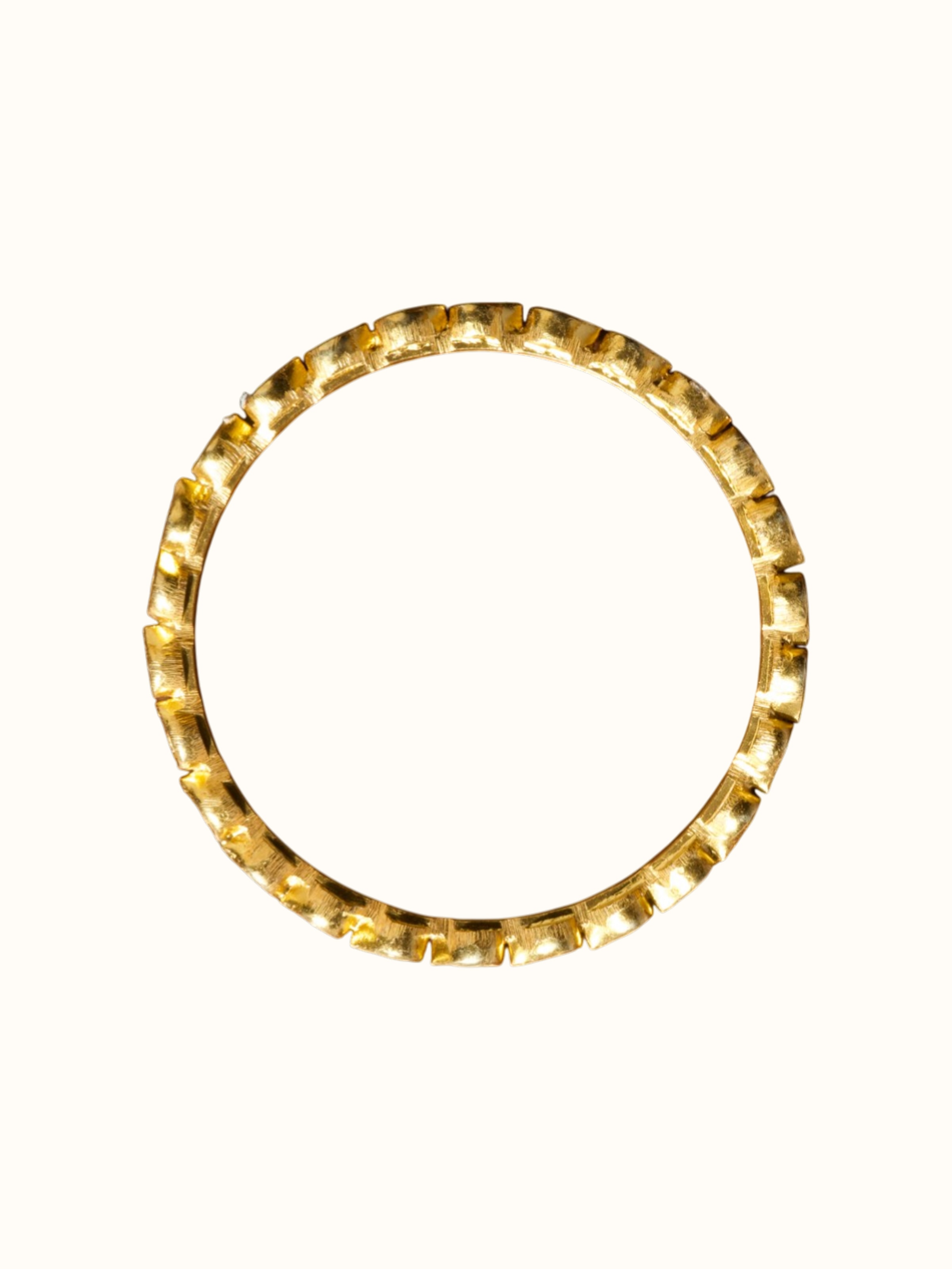 close-up view of silver smithing gold plated bangle pattern