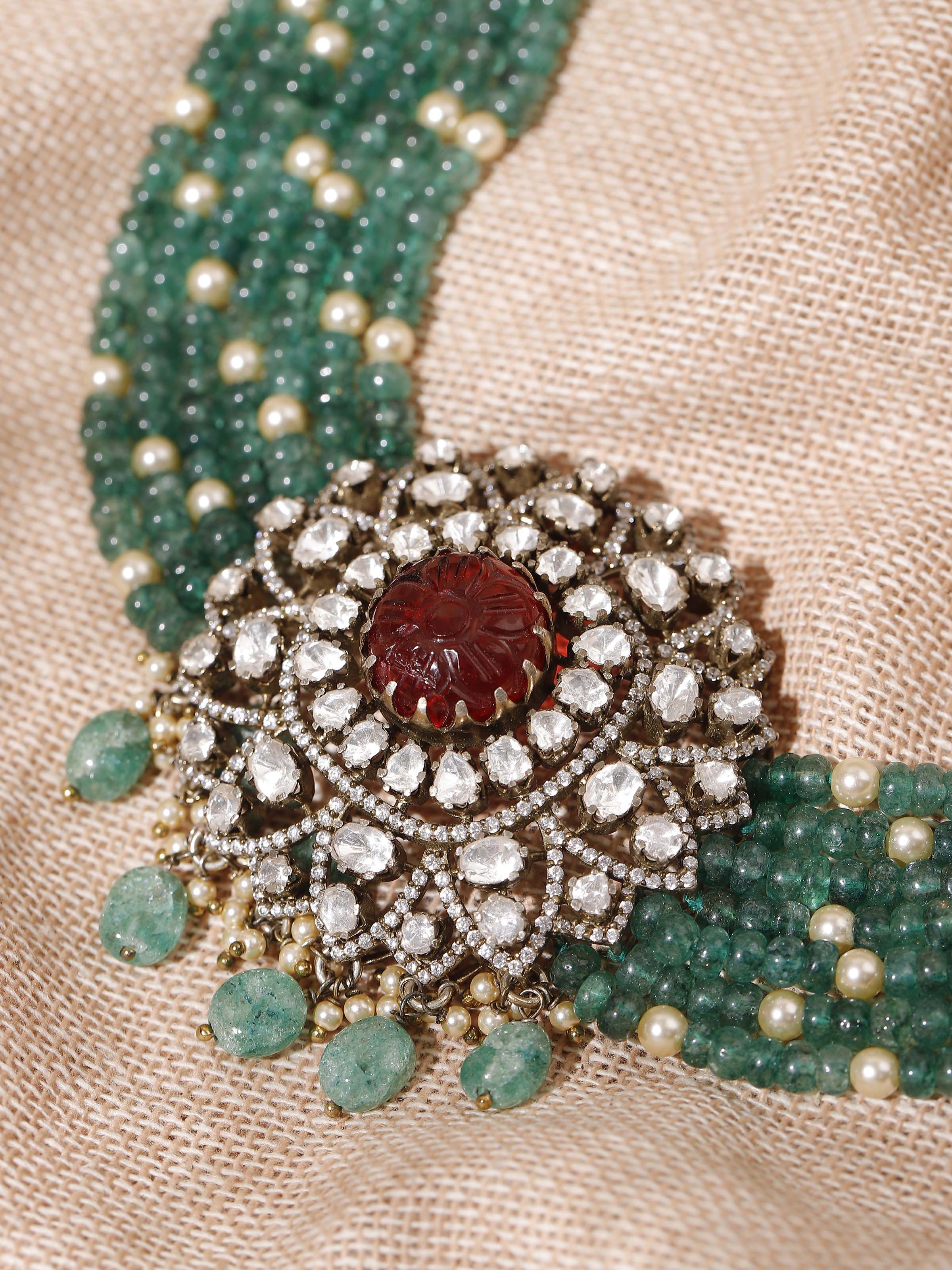 Close-up of Polki work on silver choker necklace