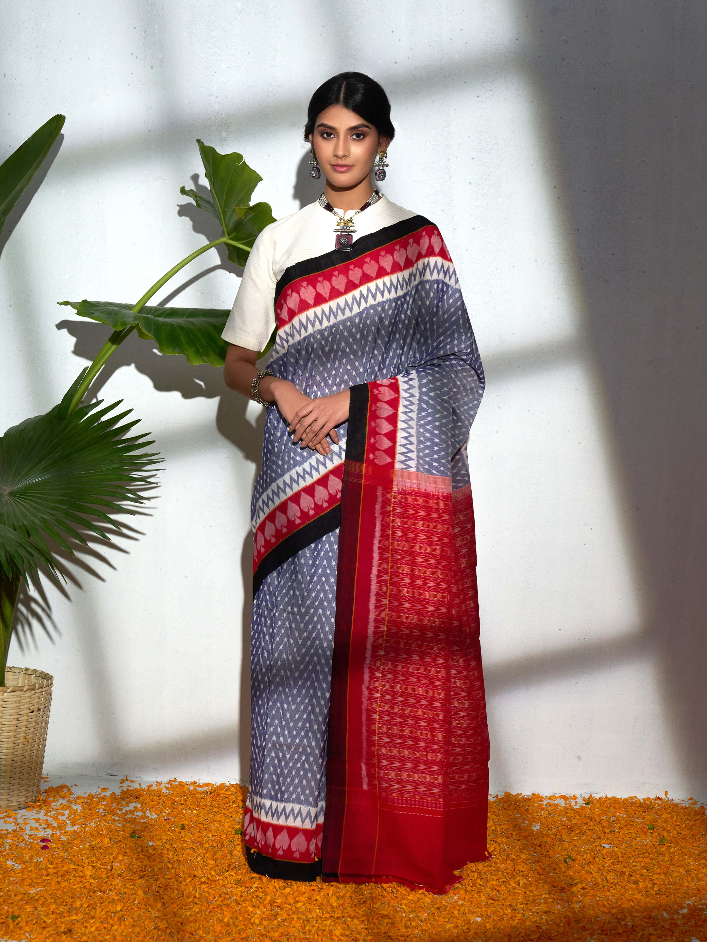Side view of grey cotton bandha Odisha ikat saree showcasing weave texture