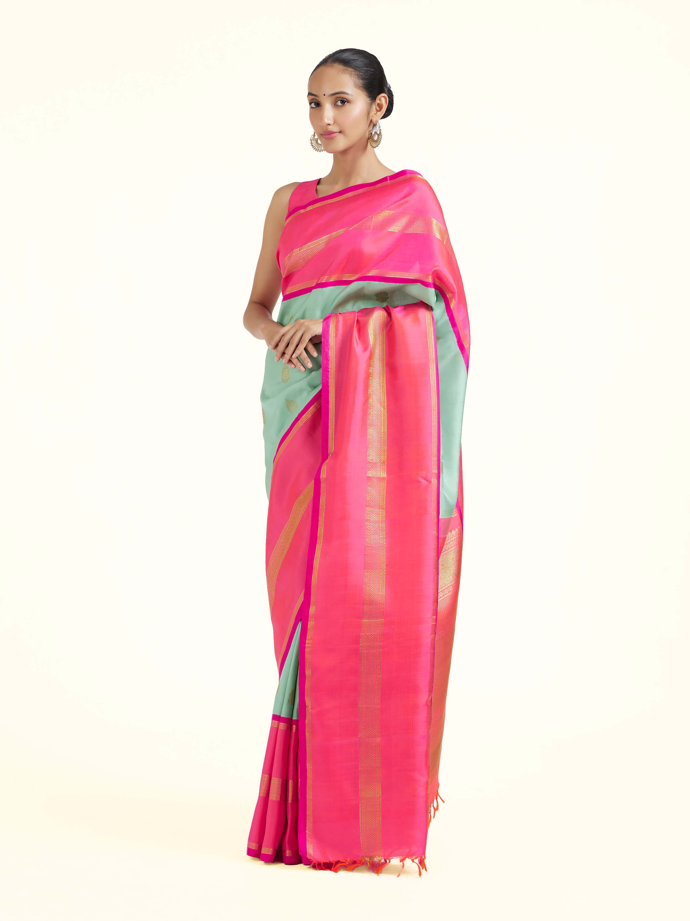 Side view of light blue silk Kancheepuram saree with graceful drape and contrast border
