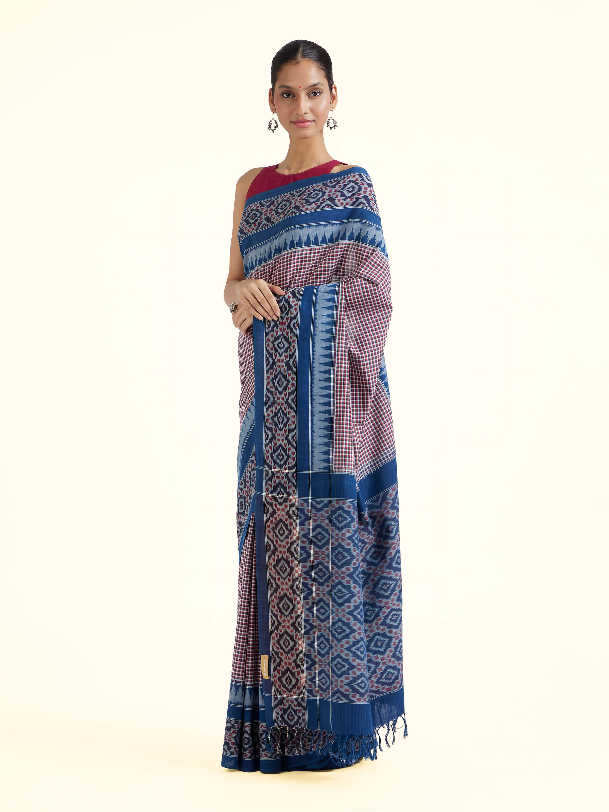 Side view of indigo natural dyed cotton ikat saree highlighting fluid drape