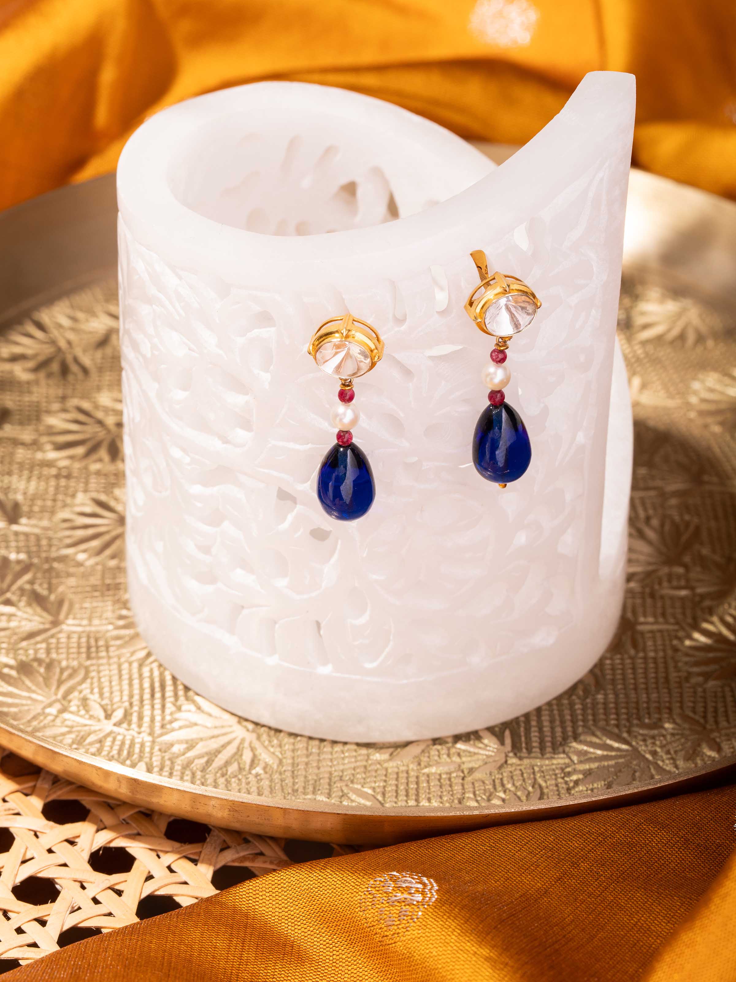 Lifestyle view of the Polki earrings paired with ethnic attire, exuding vintage elegance and luxury.