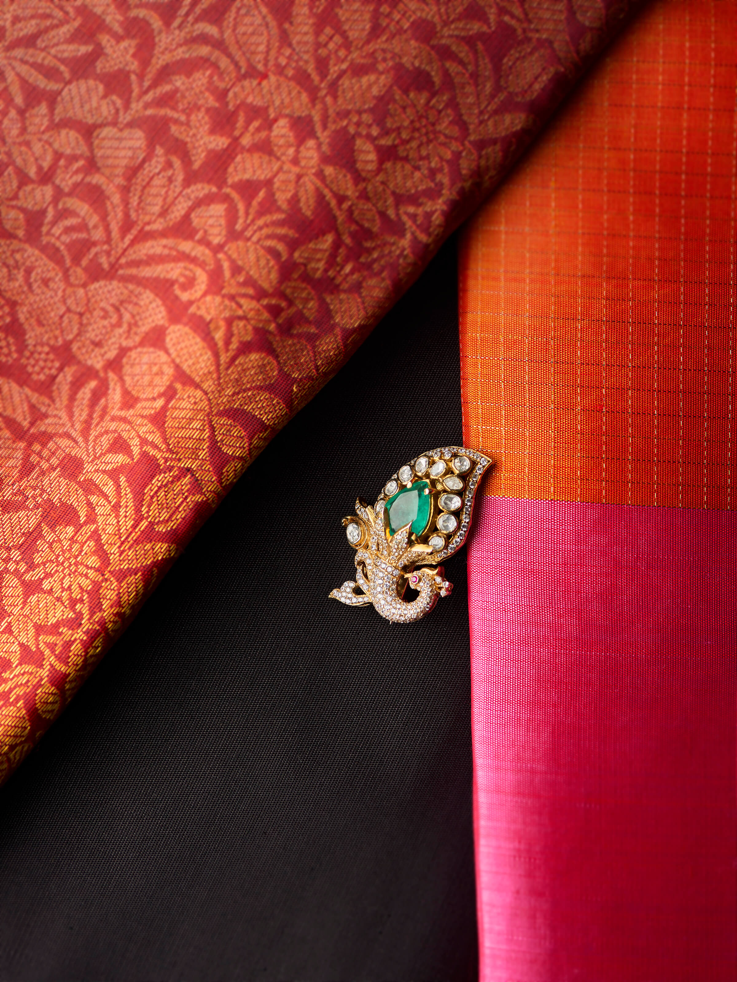 lifestyle view of silver smithing yellow gold brooch pin