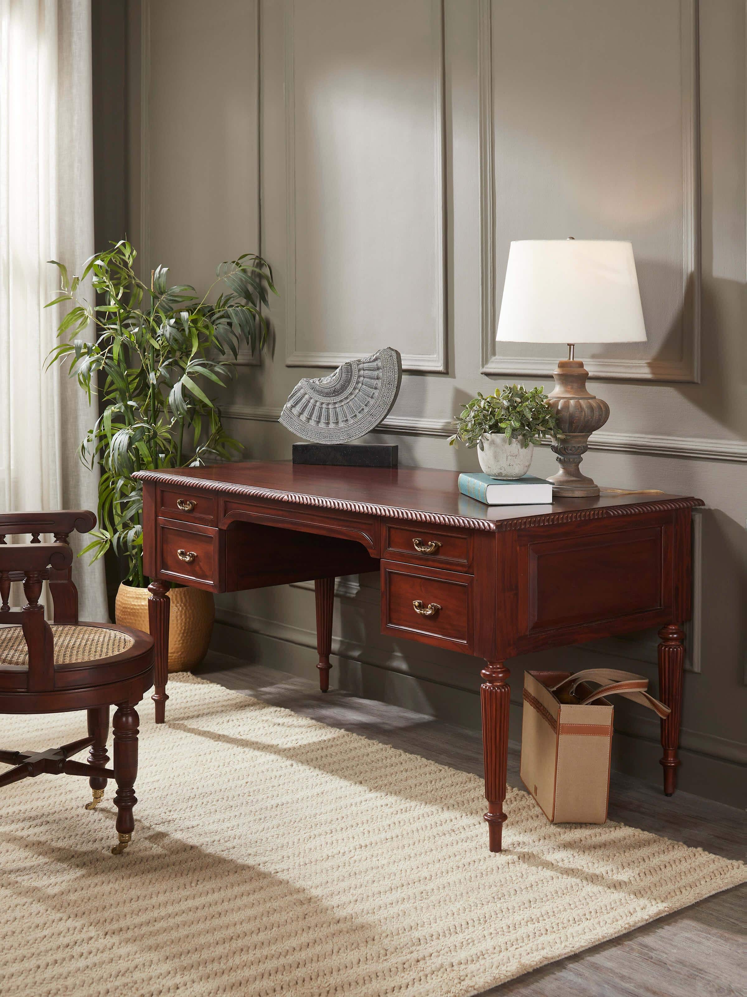 Lifestyle view of Mahogany wood study table showcasing functional workspace in an elegant setting