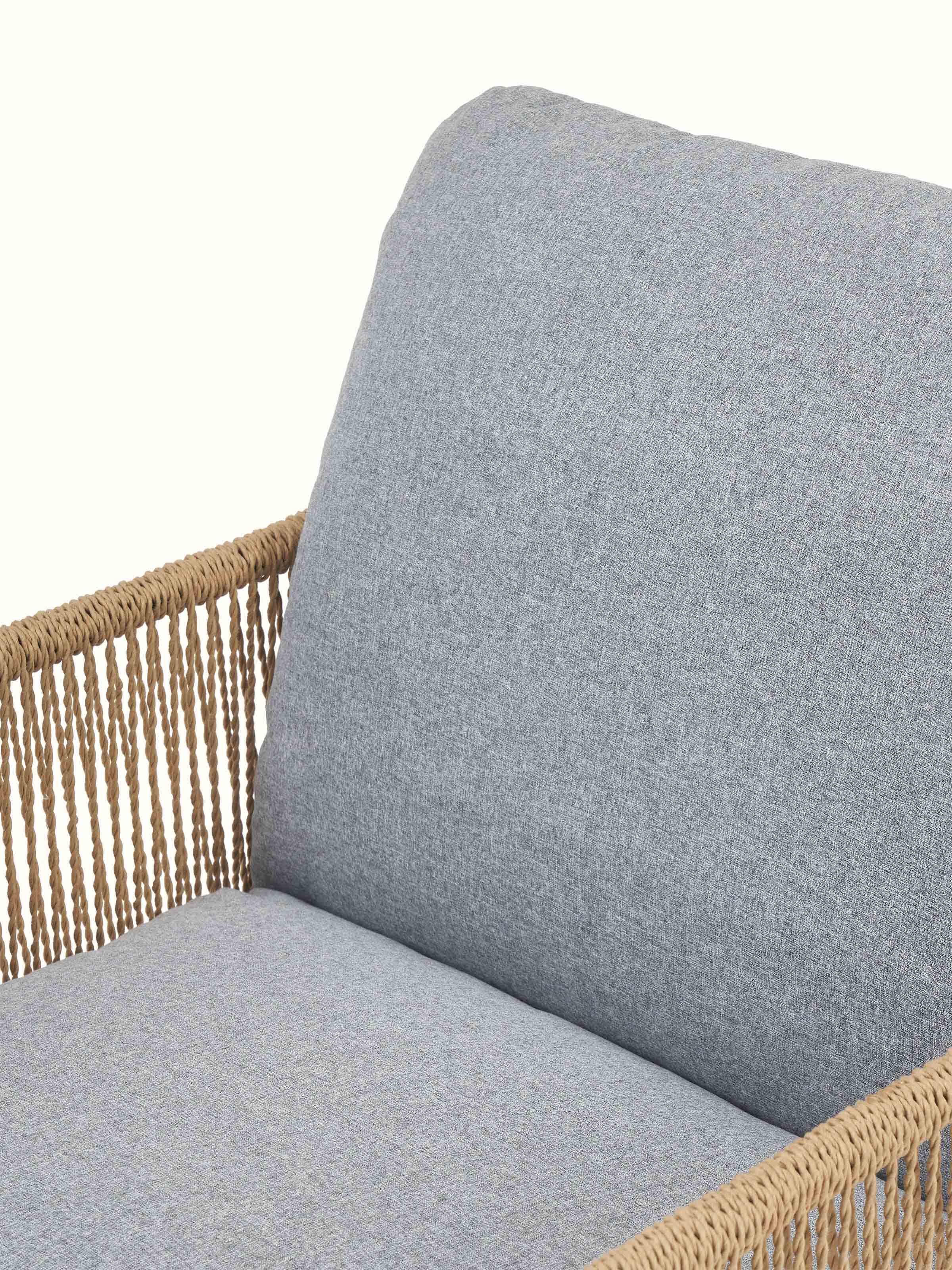 Detailed view of Upholstered Metal Paper Cord Weave Armchair focusing on the intricate weave and comfortable upholstery.